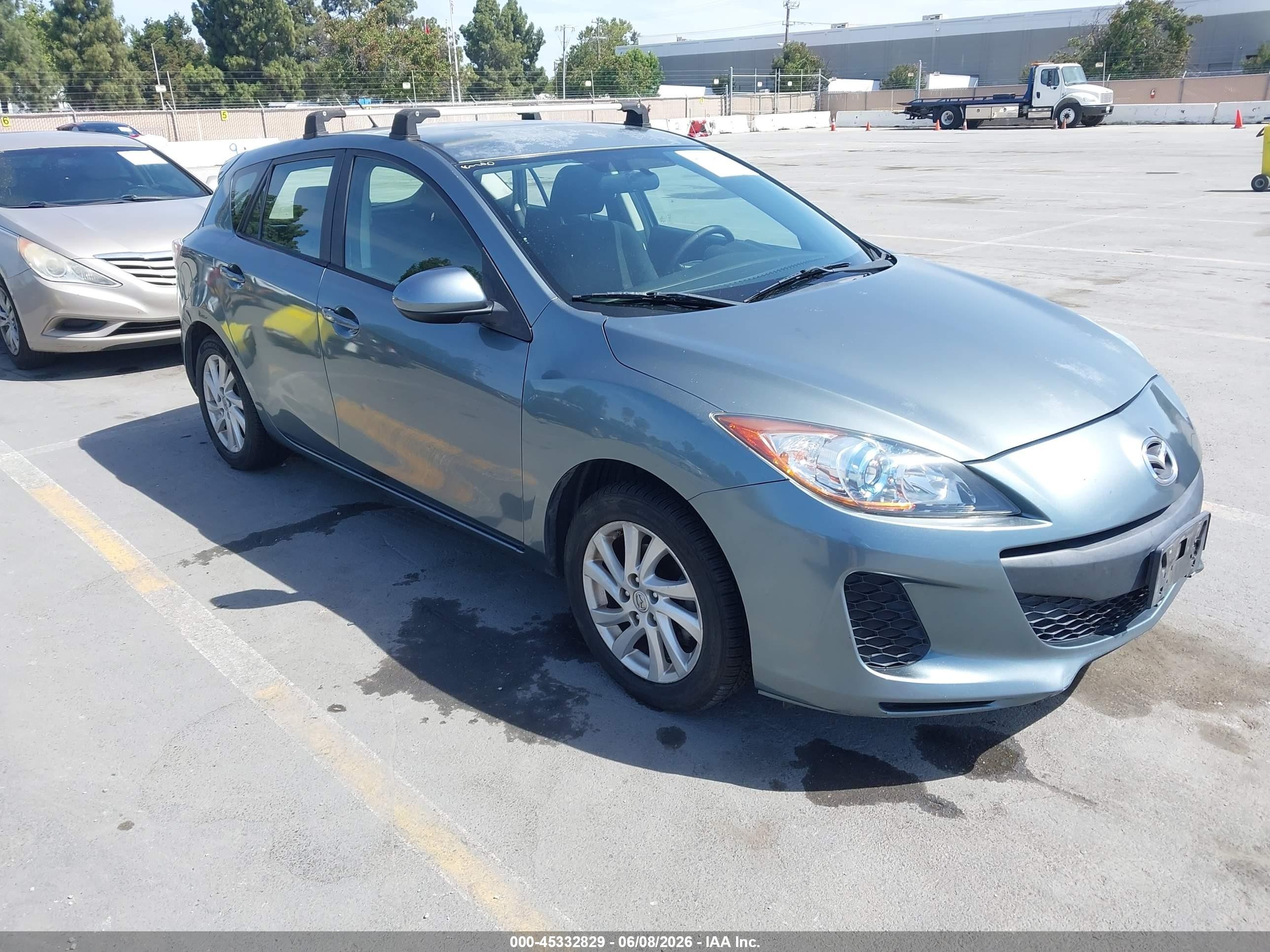 2012 Mazda Mazda3 I Touring Blue vin: JM1BL1L86C1653082