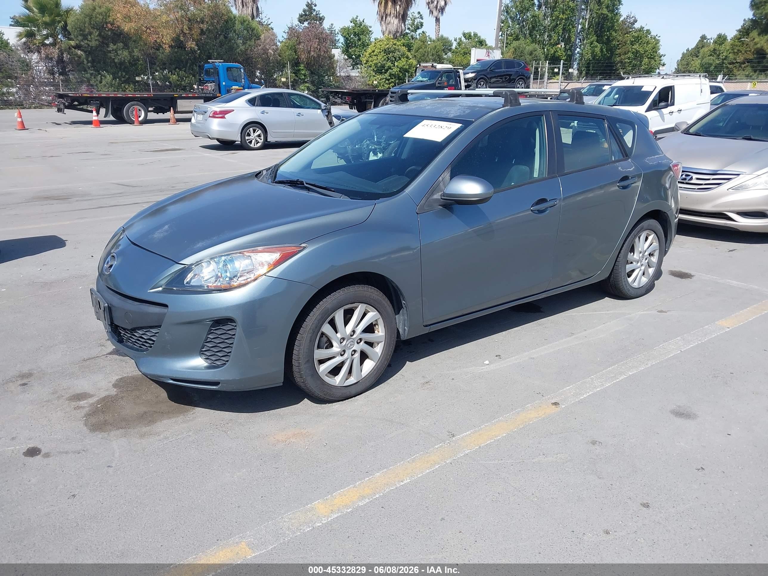 2012 Mazda Mazda3 I Touring Blue vin: JM1BL1L86C1653082