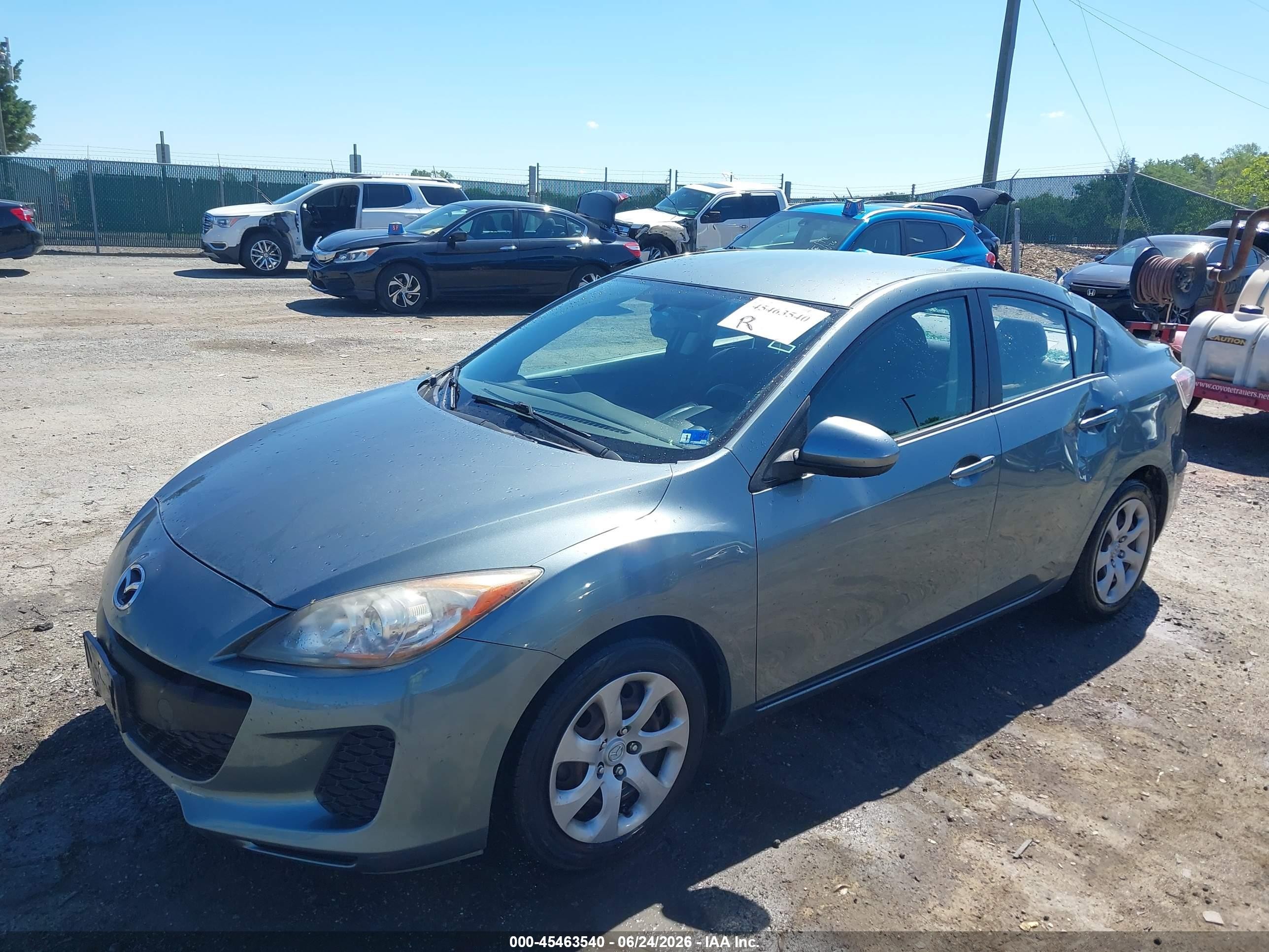 2012 Mazda Mazda3 I Sport Teal vin: JM1BL1UG5C1543856