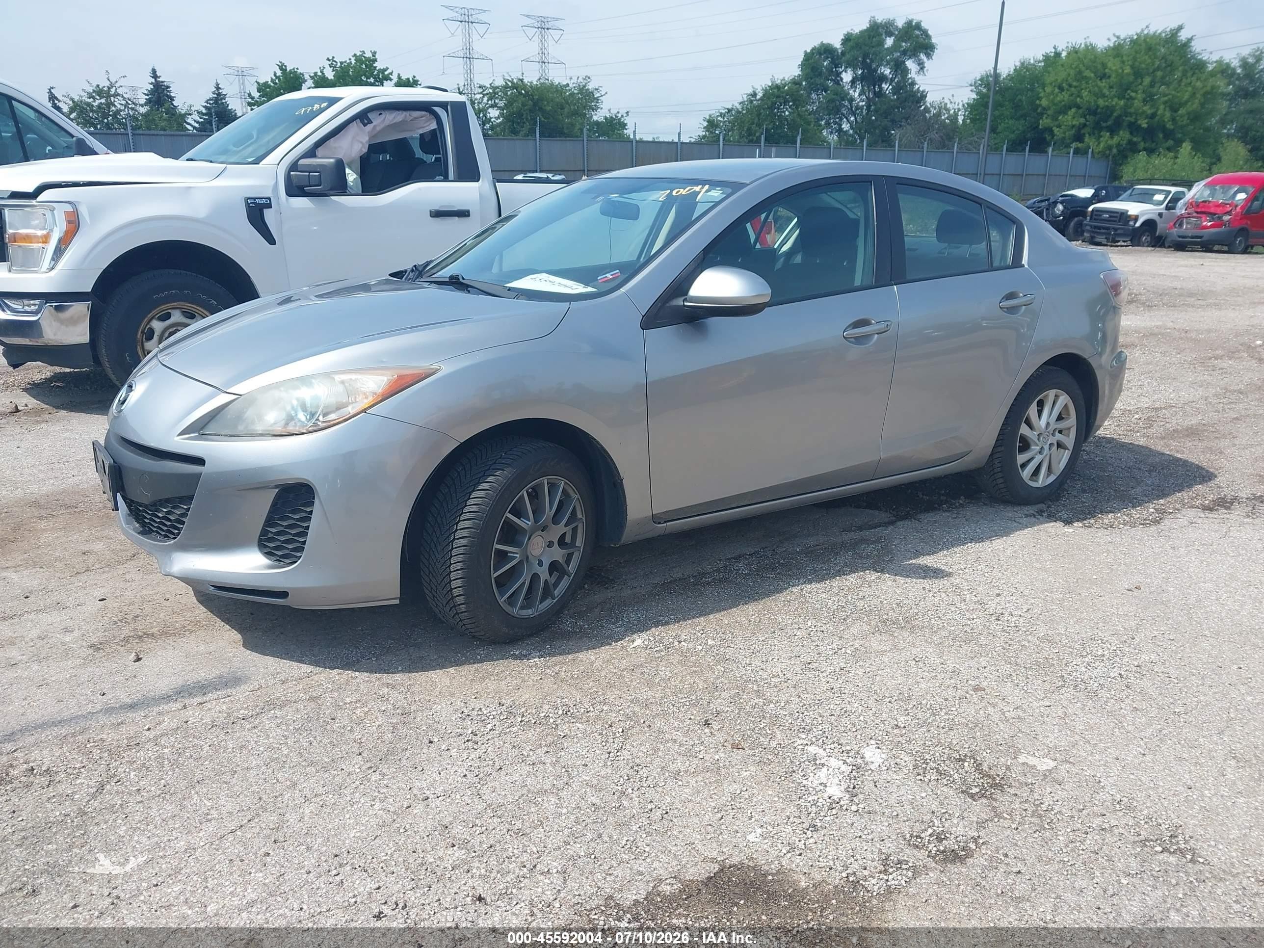 2012 Mazda Mazda3 I Touring Серебряный vin: JM1BL1V73C1551016