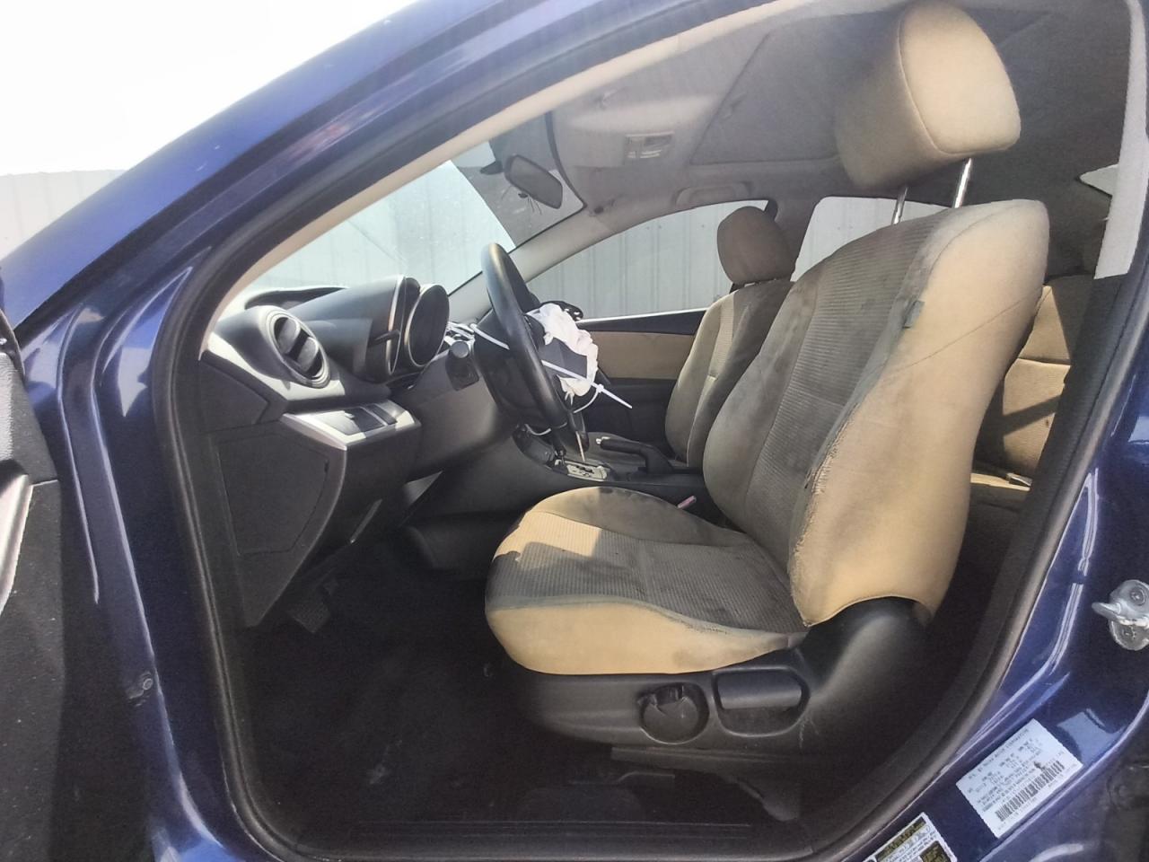 2012 Mazda 3 I Blue vin: JM1BL1V74C1670810 Damage: Left Front Seat, Stained, Permanent