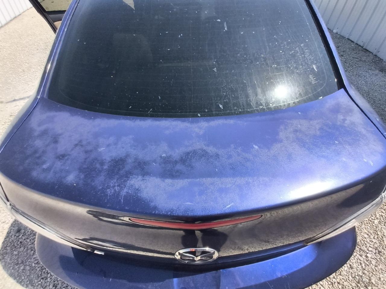 2012 Mazda 3 I Blue vin: JM1BL1V74C1670810 Damage: Deck Lid, Chipped, 10 Or More