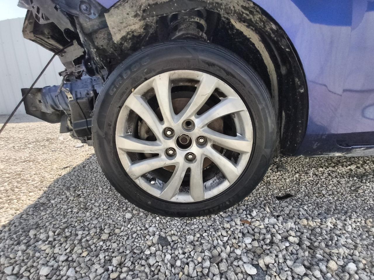 2012 Mazda 3 I Blue vin: JM1BL1V74C1670810 Damage: Left Front Wheel, Curb Rash, > 12 Inches