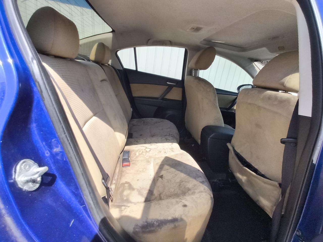 2012 Mazda 3 I Blue vin: JM1BL1V74C1670810 Damage: Left Rear Seat, Stained, Permanent