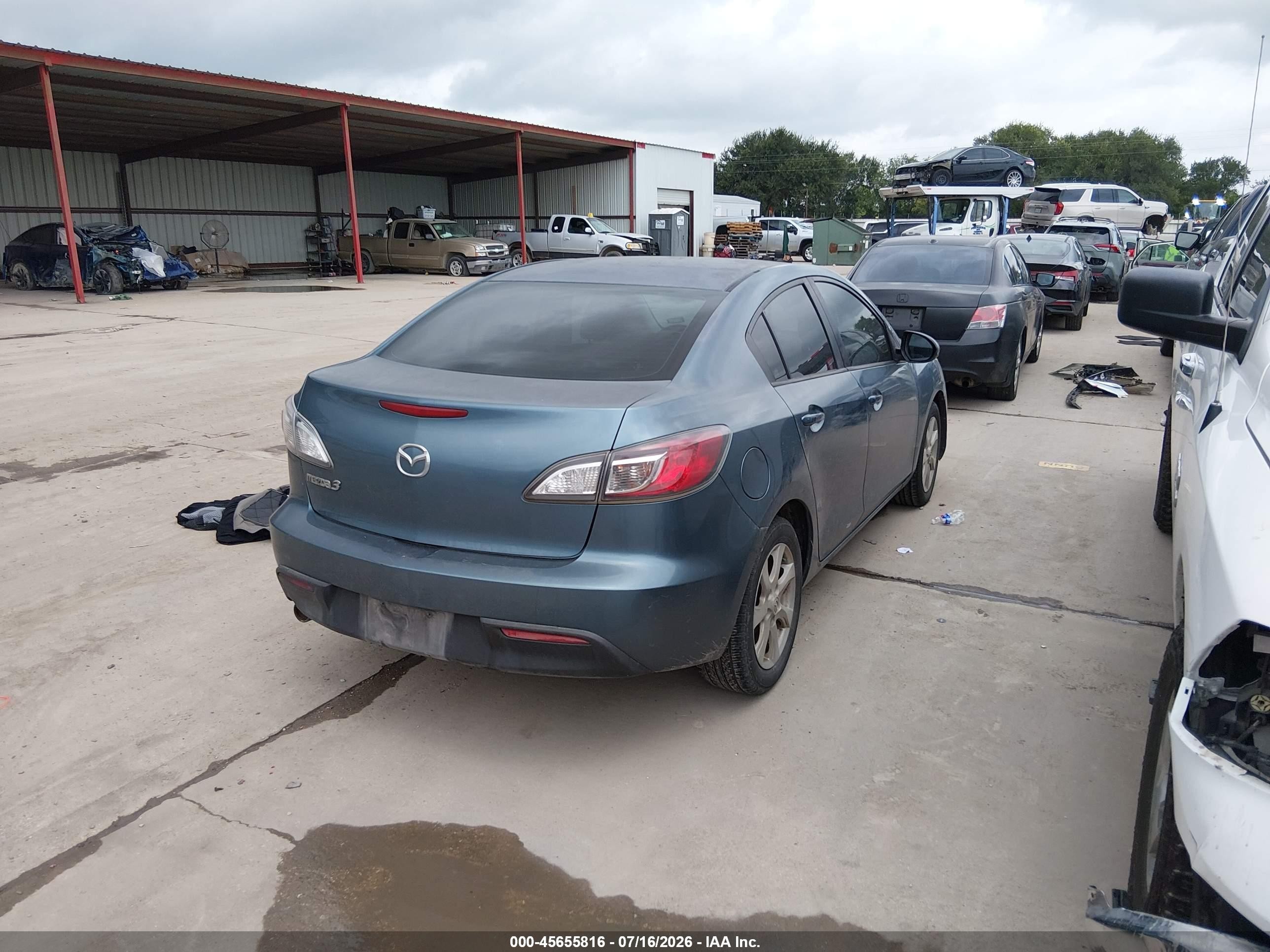 2011 Mazda Mazda3 I Touring Teal vin: JM1BL1VF8B1485679
