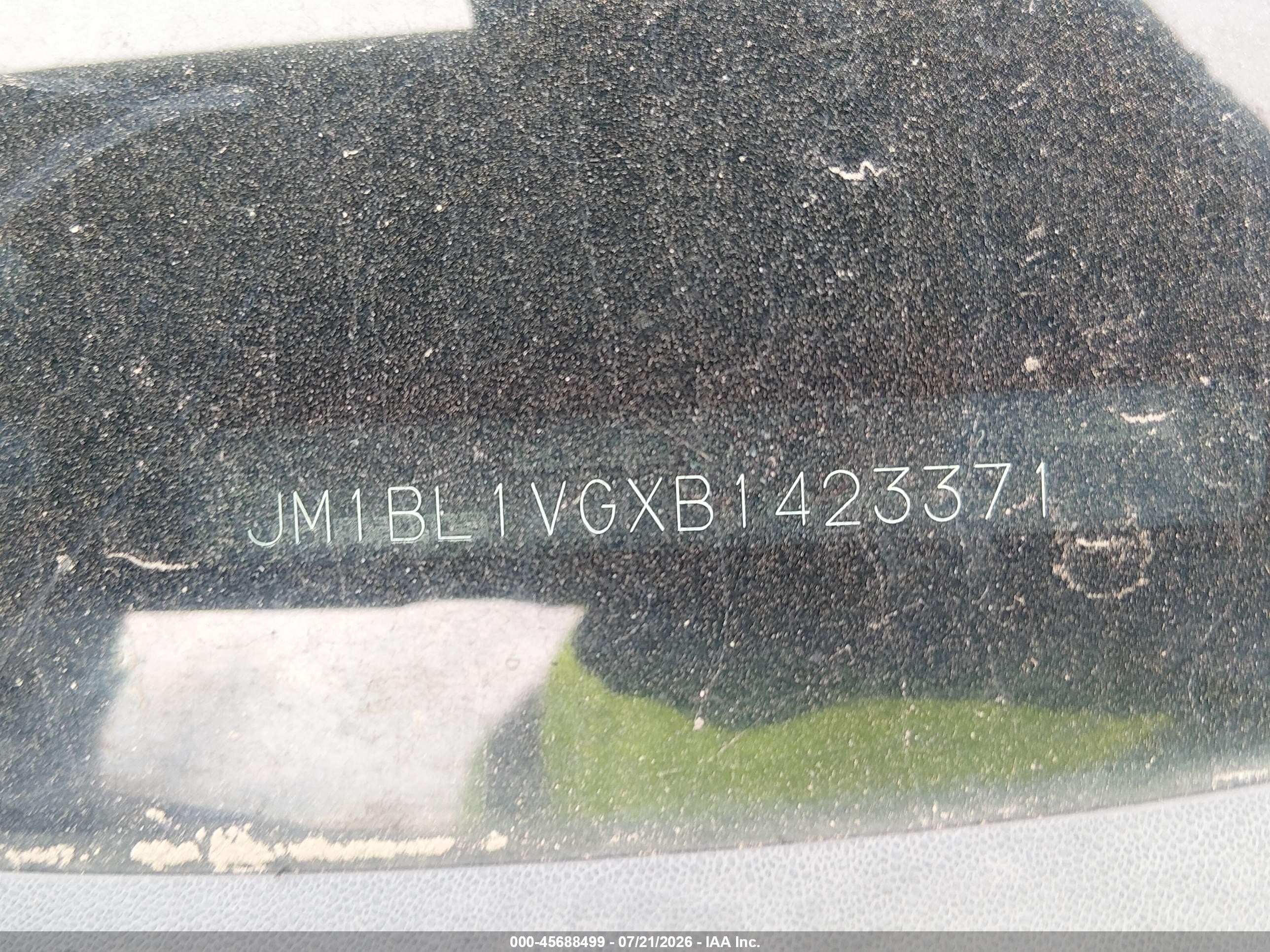 2011 Mazda Mazda3 I Touring Teal vin: JM1BL1VGXB1423371