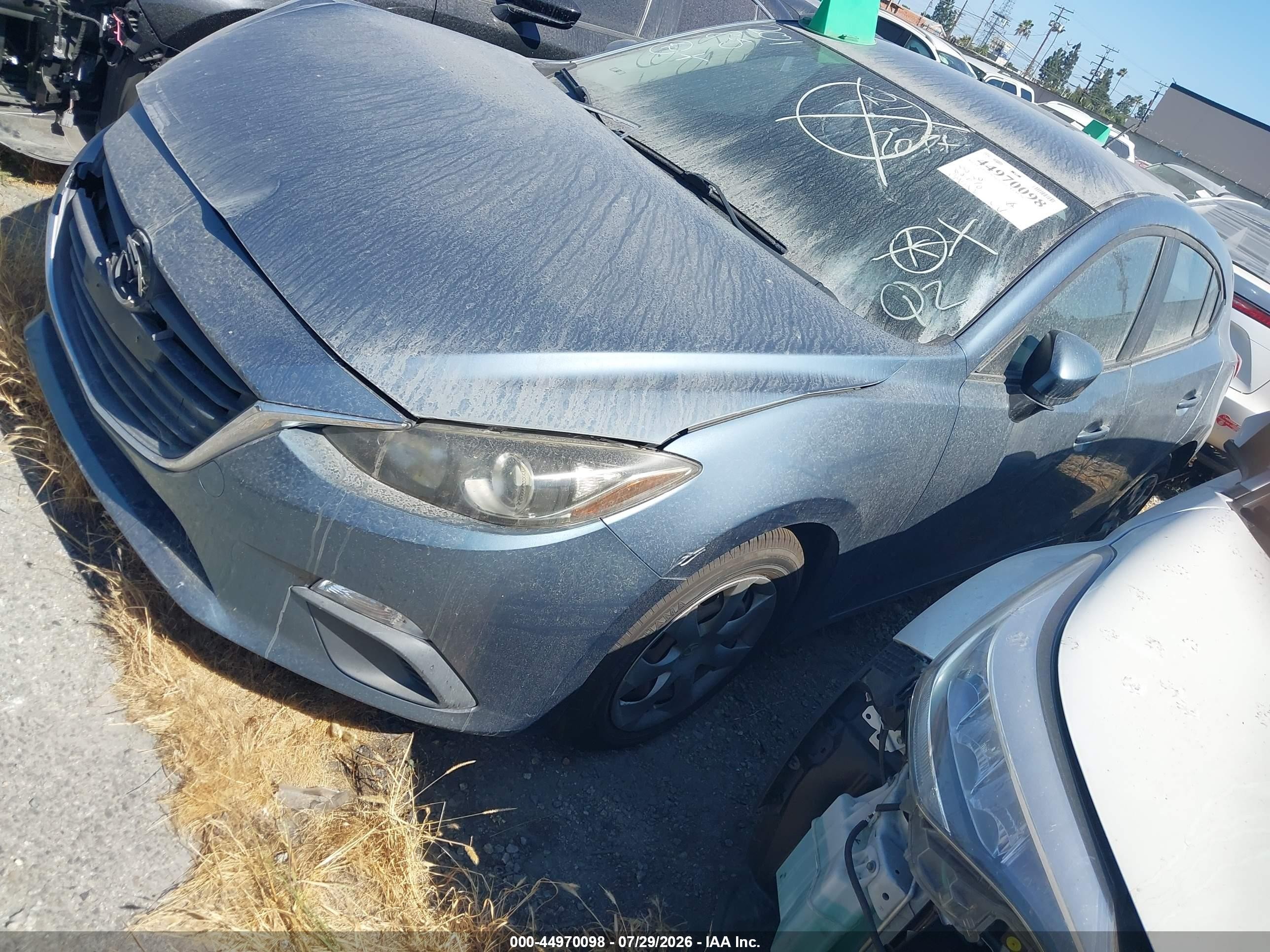 2014 Mazda Mazda3 I Sport Teal vin: JM1BM1K70E1200648