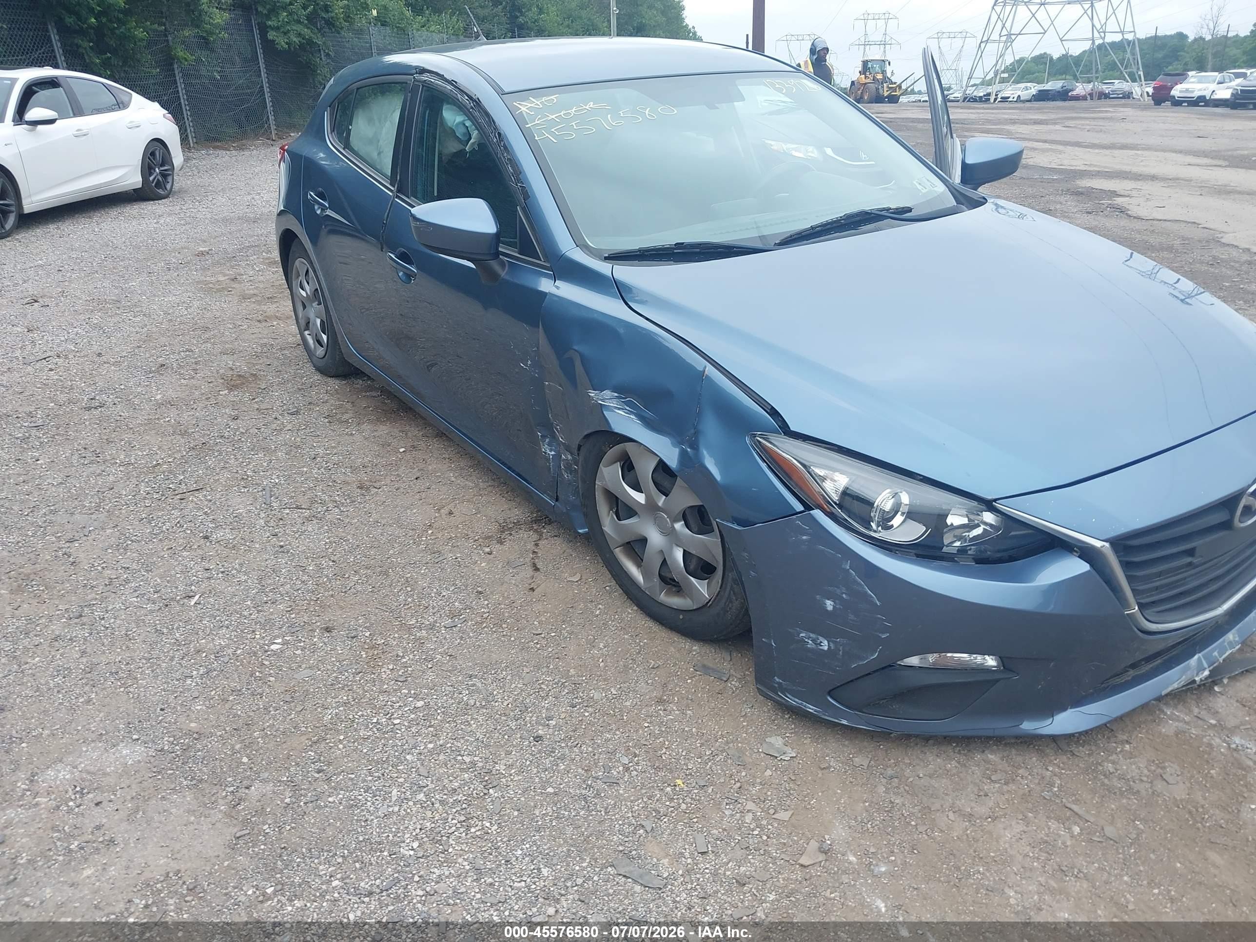 2014 Mazda Mazda3   Light Blue vin: JM1BM1K76E1133926