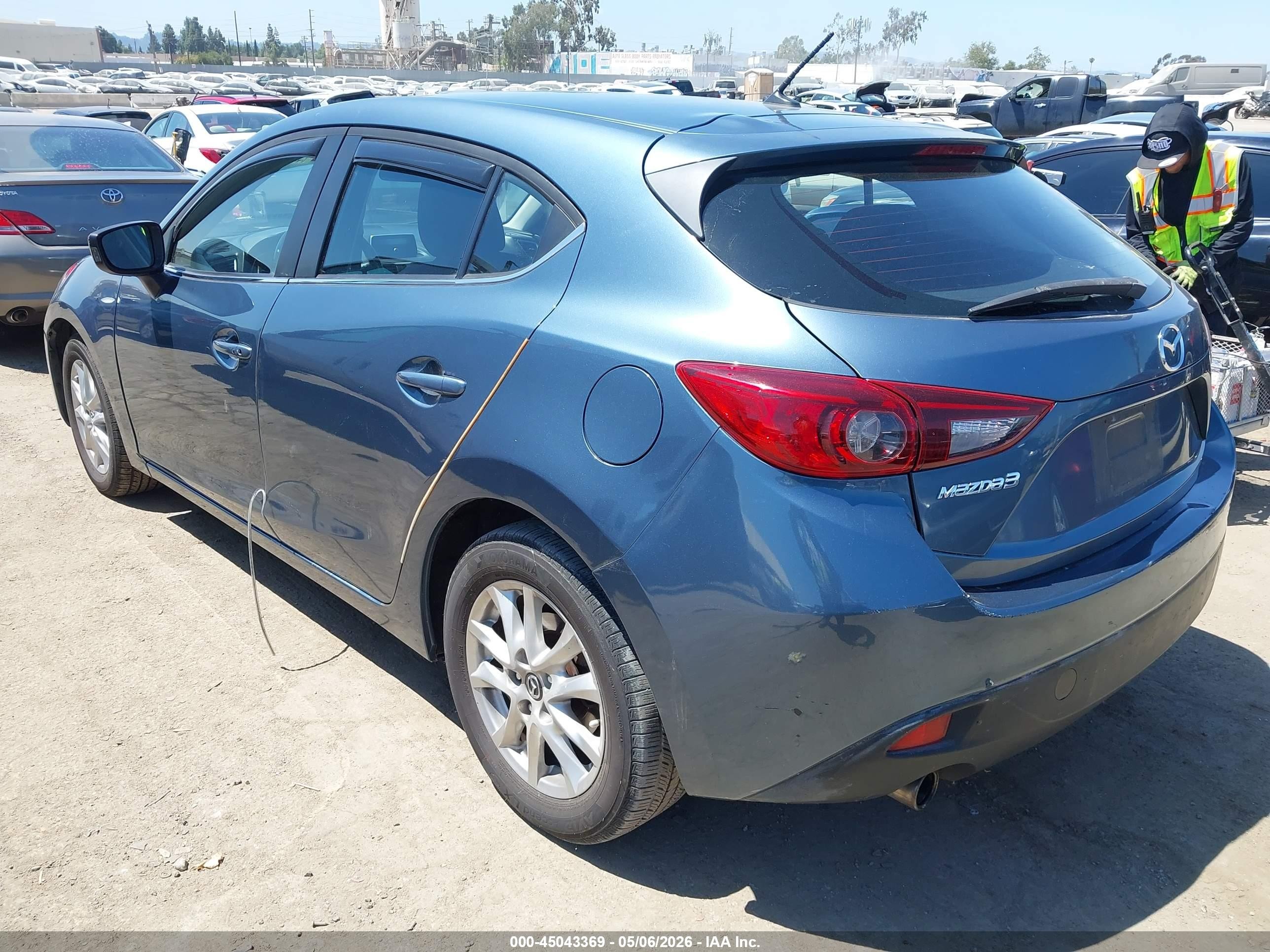 2014 Mazda Mazda3 I Touring Синий vin: JM1BM1L71E1118085