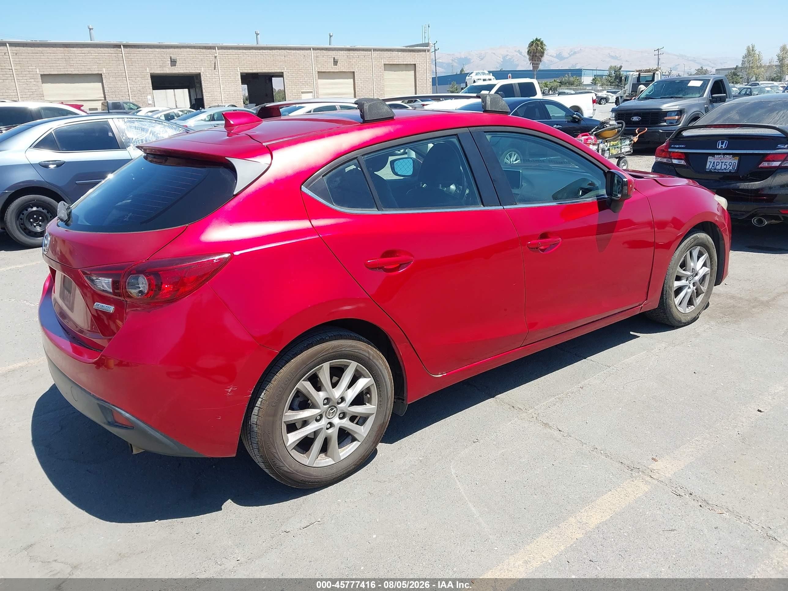 2015 Mazda Mazda3 I Grand Touring Red vin: JM1BM1M75F1241078