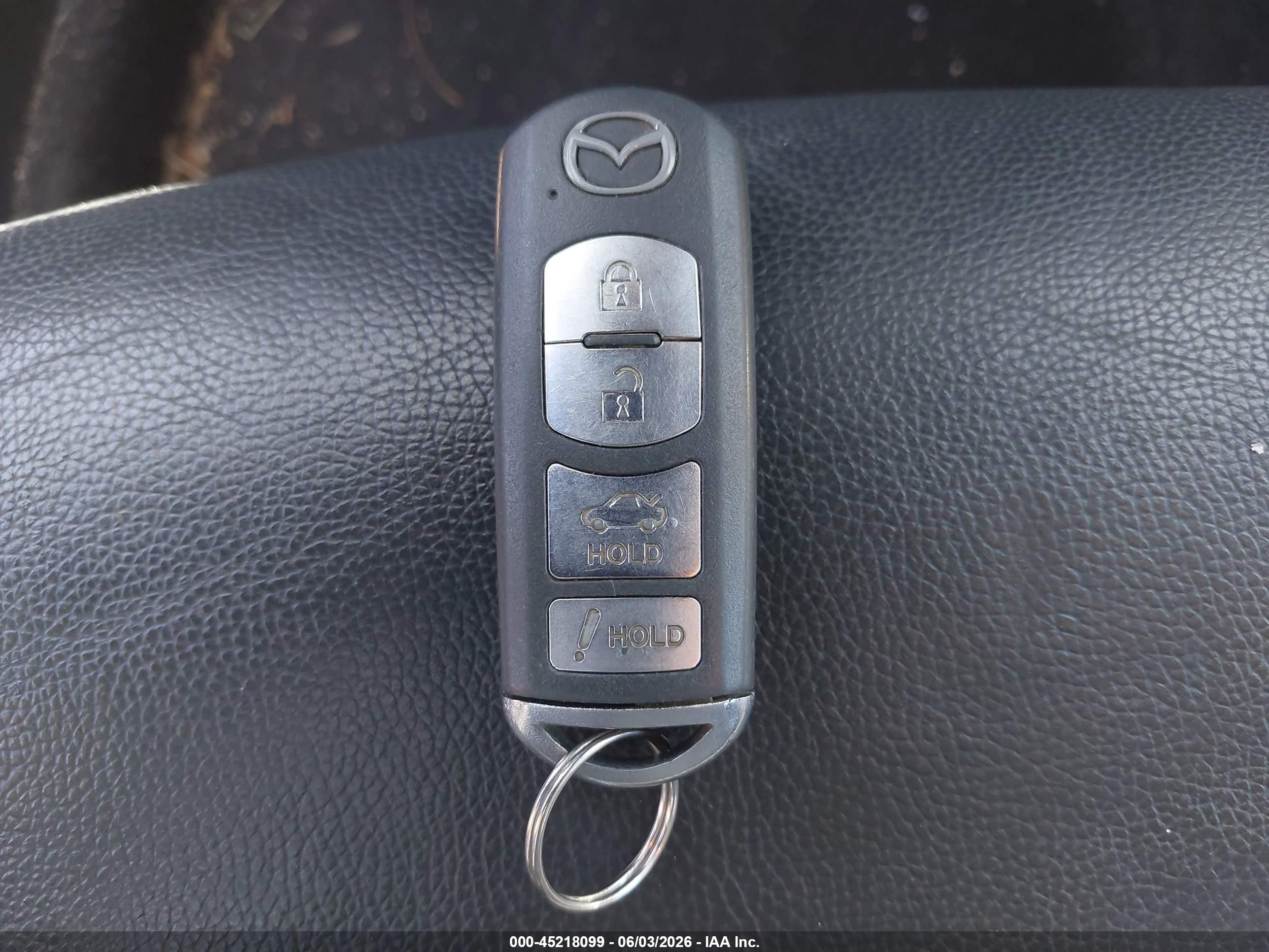 2015 Mazda Mazda3 I Touring Черный vin: JM1BM1V70F1271801