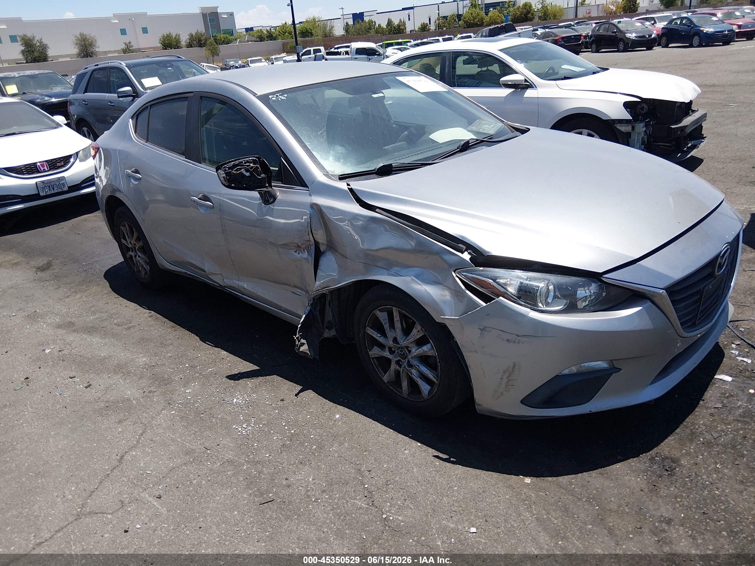 2014 Mazda Mazda3 I Touring Silver vin: JM1BM1V72E1114561