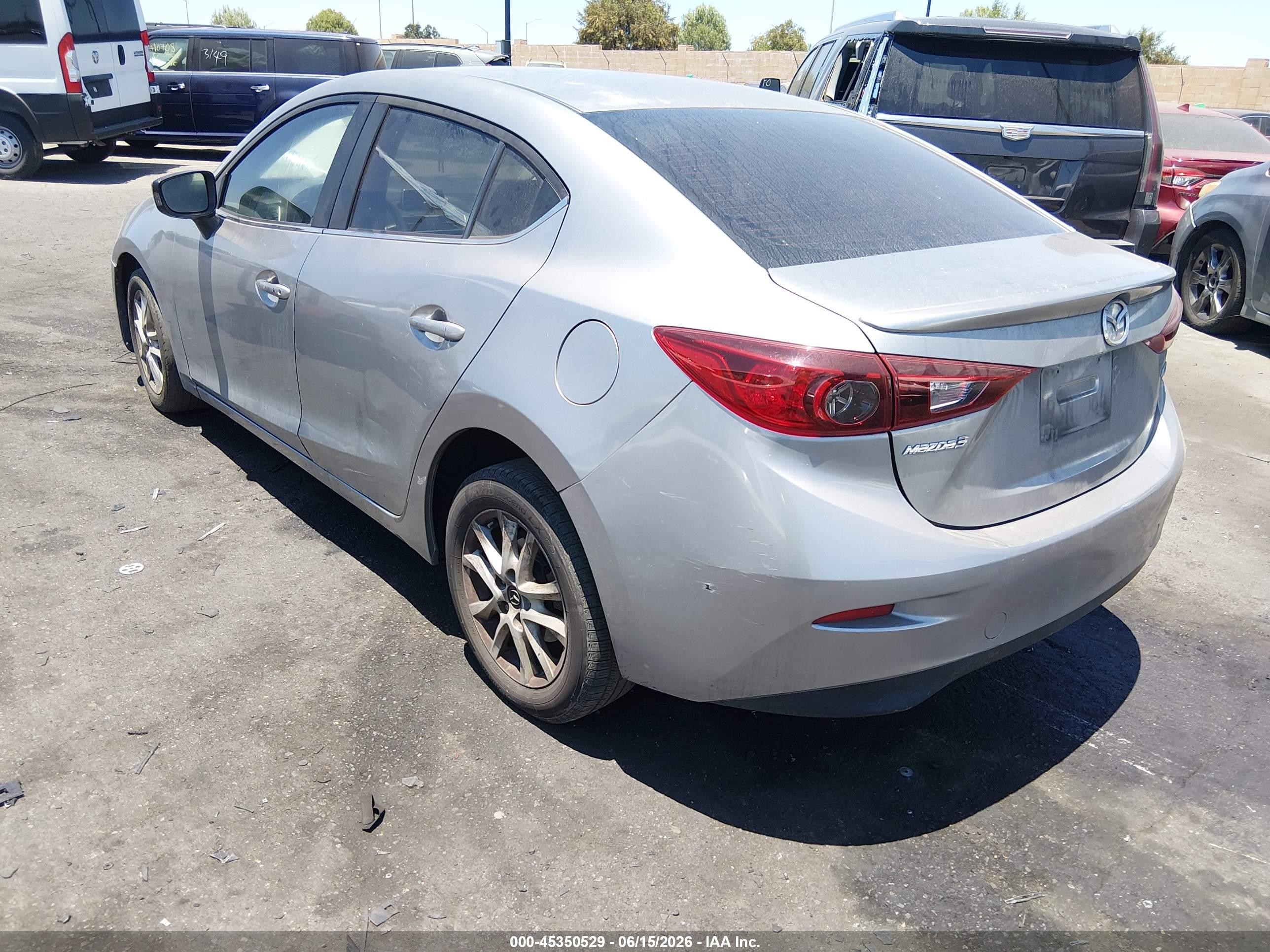 2014 Mazda Mazda3 I Touring Silver vin: JM1BM1V72E1114561