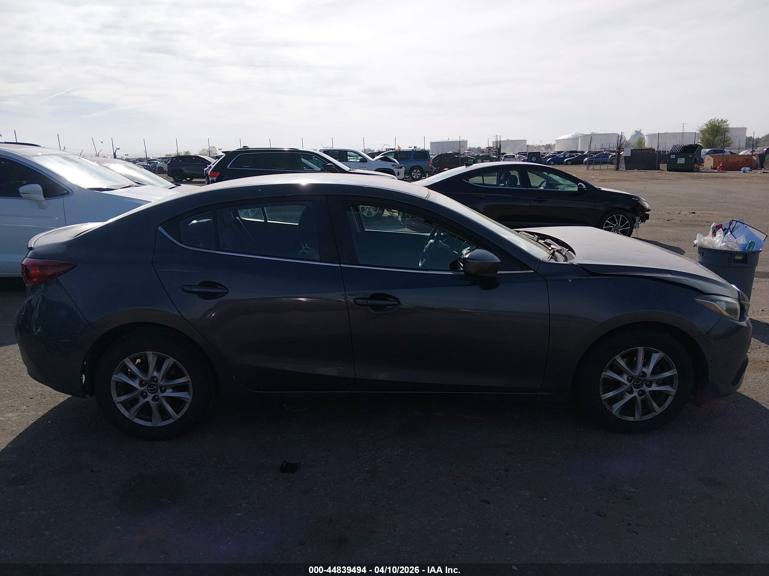 2014 Mazda Mazda3 I Touring Silver vin: JM1BM1V73E1111149