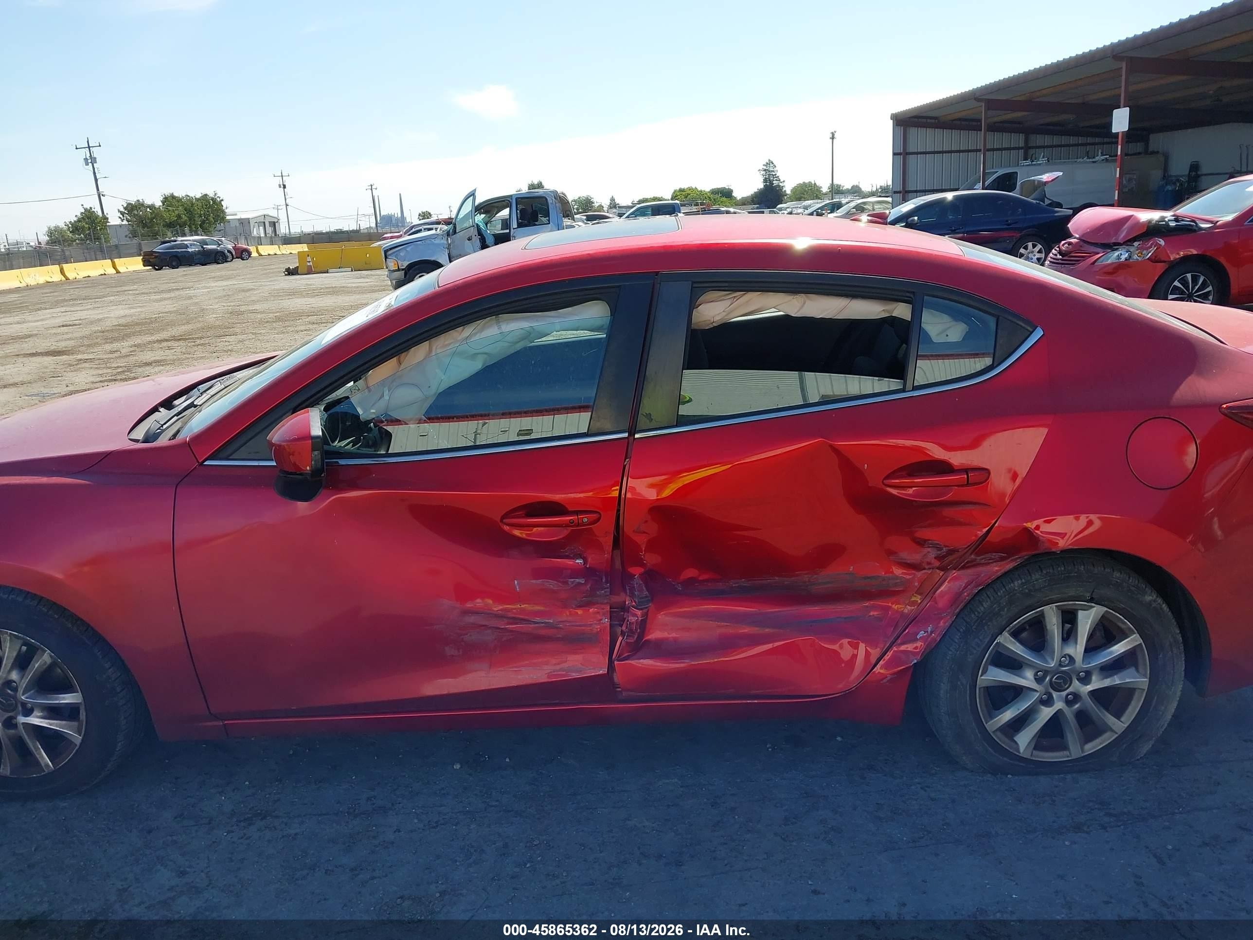 2015 Mazda Mazda3 I Touring Red vin: JM1BM1V79F1242278