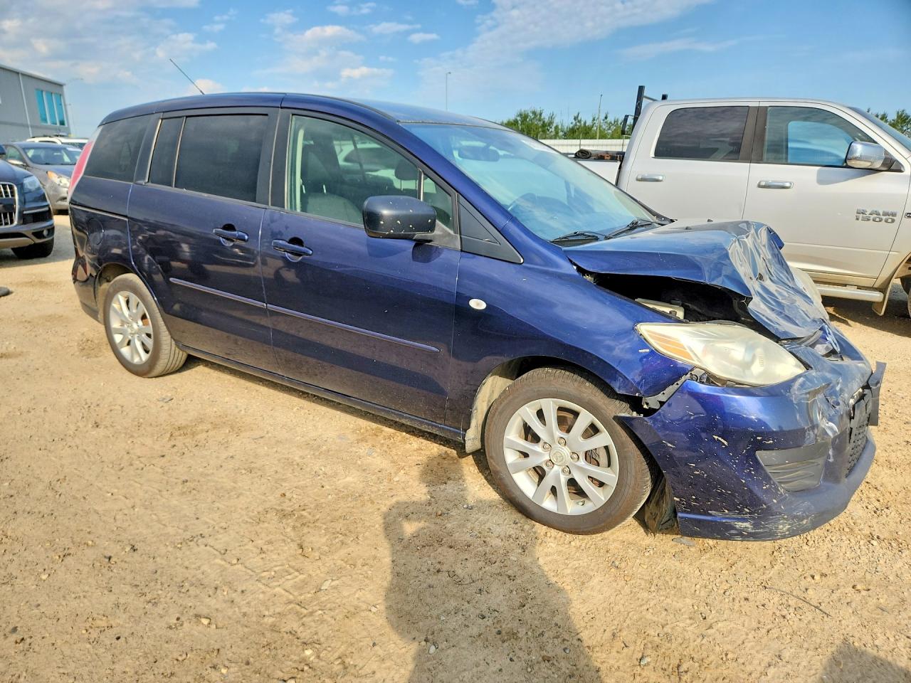 2009 Mazda Mazda5 Blue vin: JM1CR293890352879