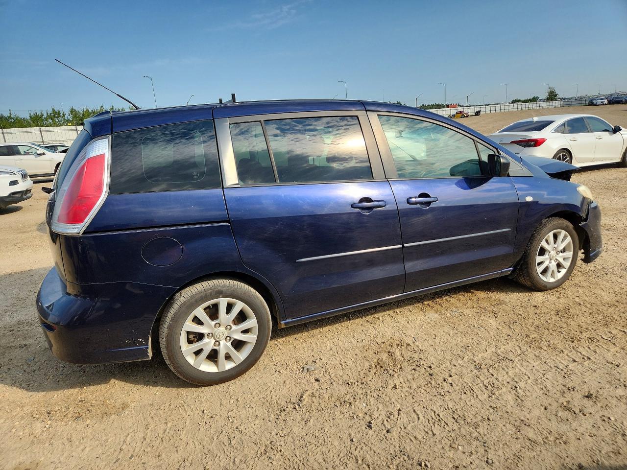 2009 Mazda Mazda5 Blue vin: JM1CR293890352879