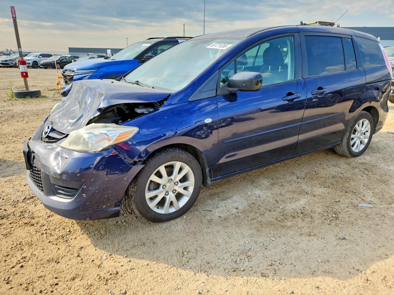 2009 Mazda Mazda5 Blue vin: JM1CR293890352879