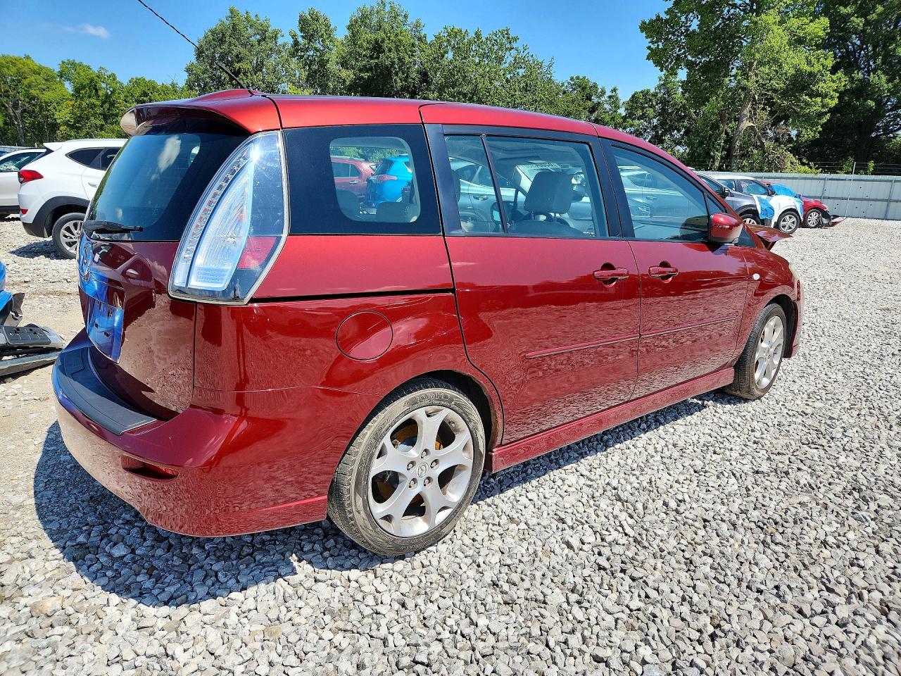 2009 Mazda 5 Темно-бордовый vin: JM1CR29L590328927