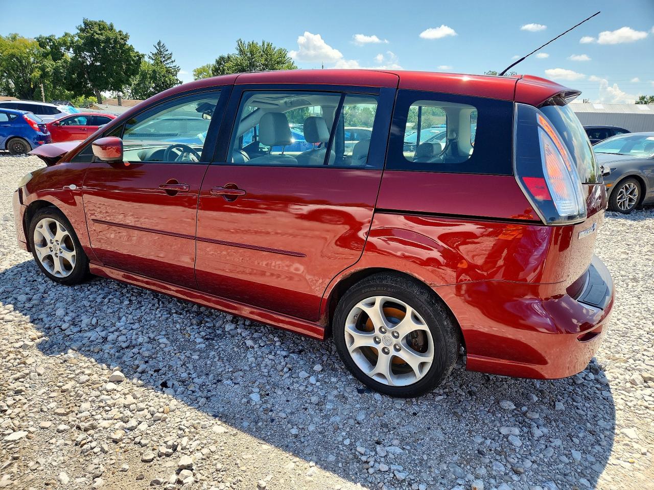 2009 Mazda 5 Темно-бордовый vin: JM1CR29L590328927