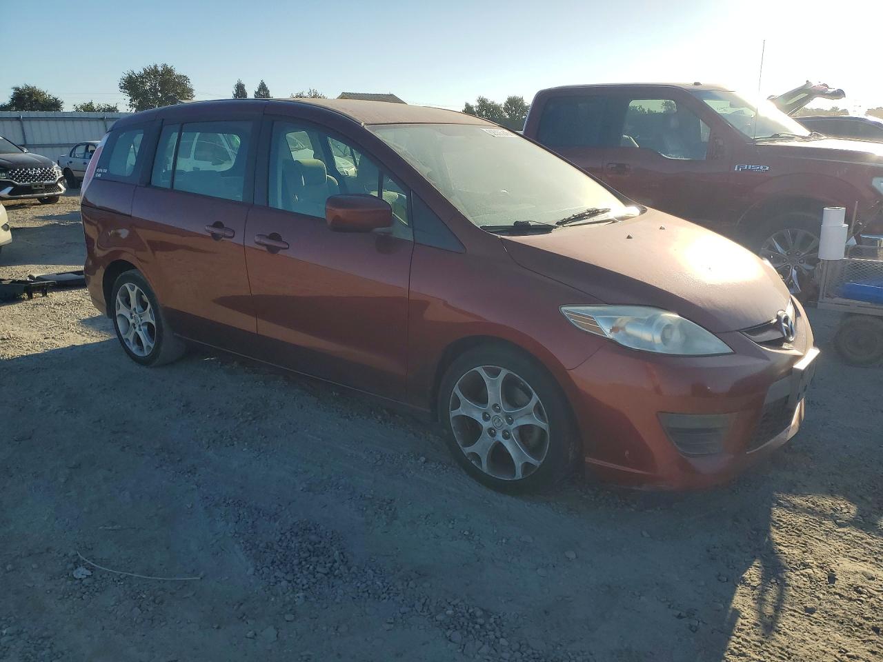2010 Mazda 5 Red vin: JM1CR2WL5A0387923