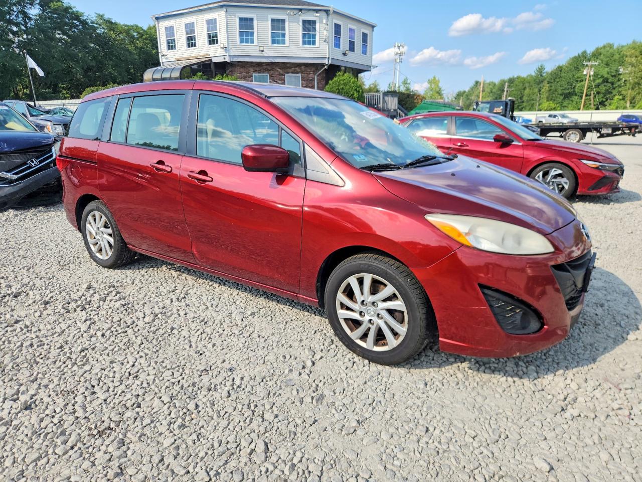 2012 Mazda 5 Red vin: JM1CW2BL0C0119654