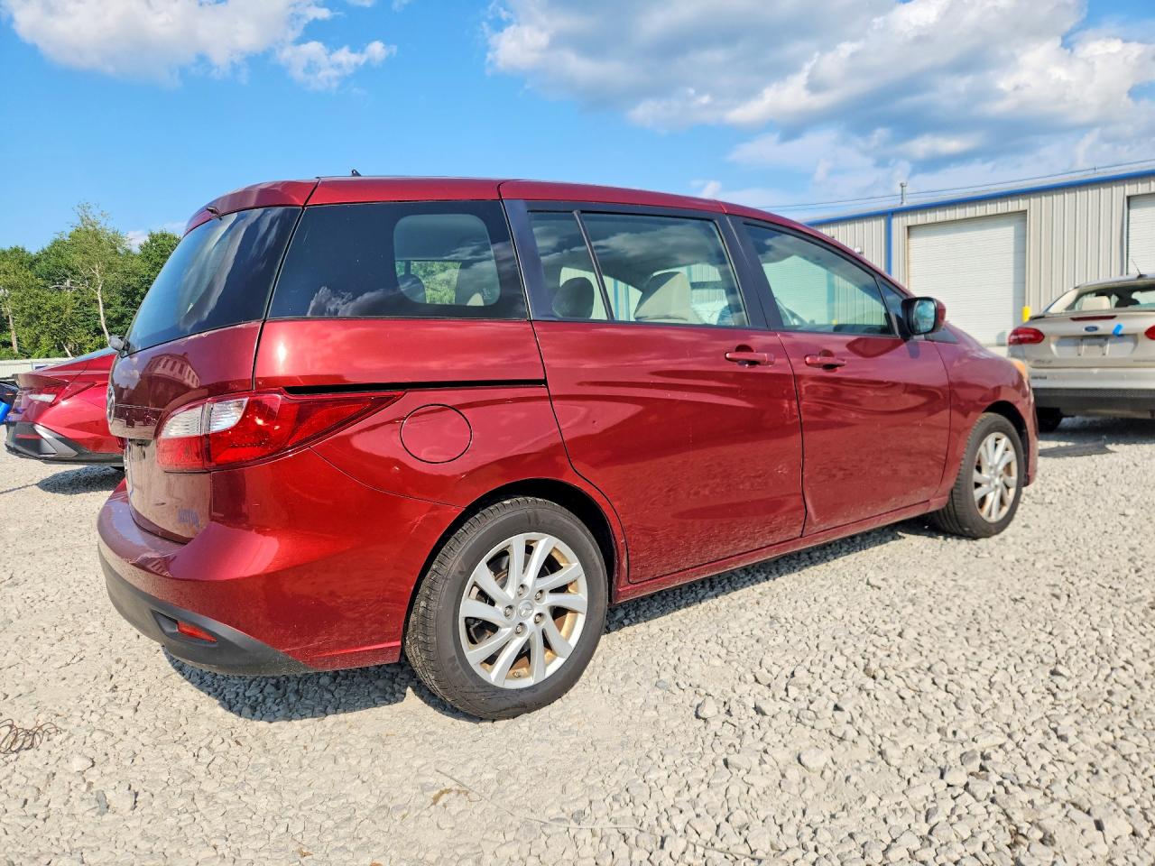 2012 Mazda 5 Red vin: JM1CW2BL0C0119654