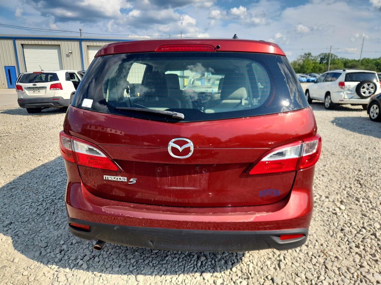 2012 Mazda 5 Red vin: JM1CW2BL0C0119654