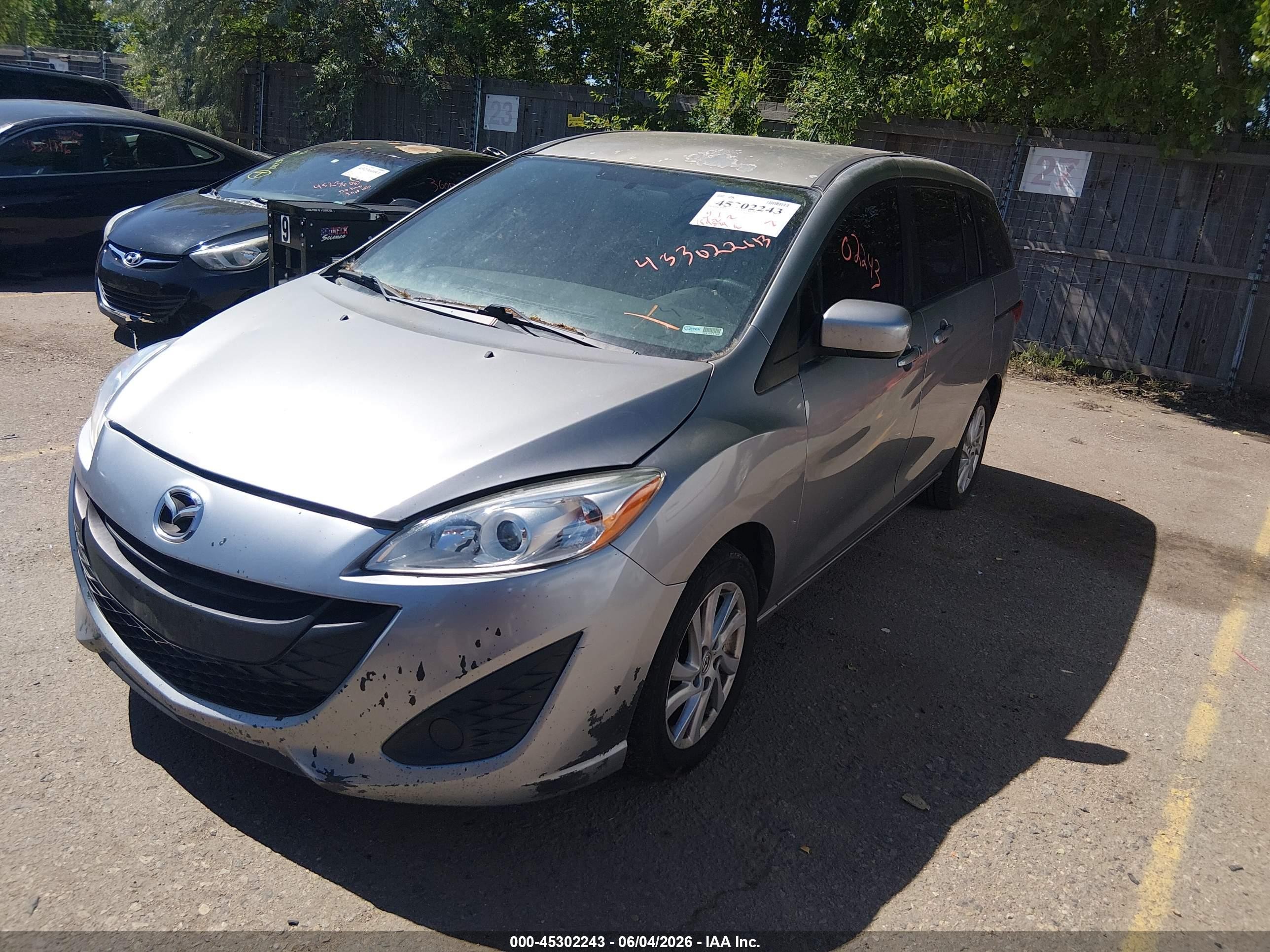 2012 Mazda Mazda5 Sport Серебряный vin: JM1CW2BL0C0136180