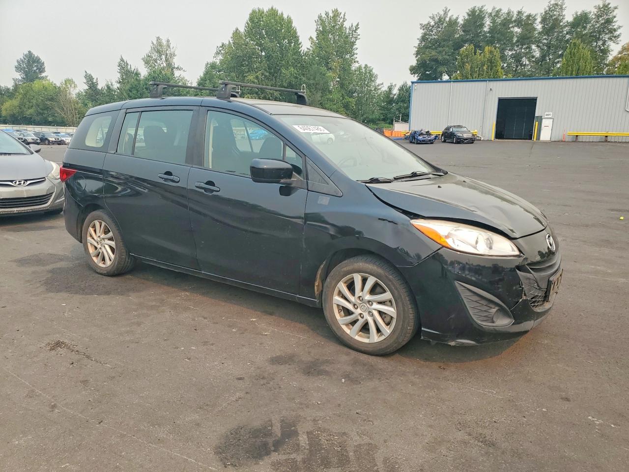 2012 Mazda 5 Black vin: JM1CW2BL1C0117525