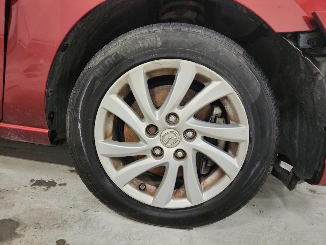 2012 Mazda 5 Red vin: JM1CW2BL3C0144046 Damage: Right Front Wheel, Curb Rash, 11 To 12 Inches