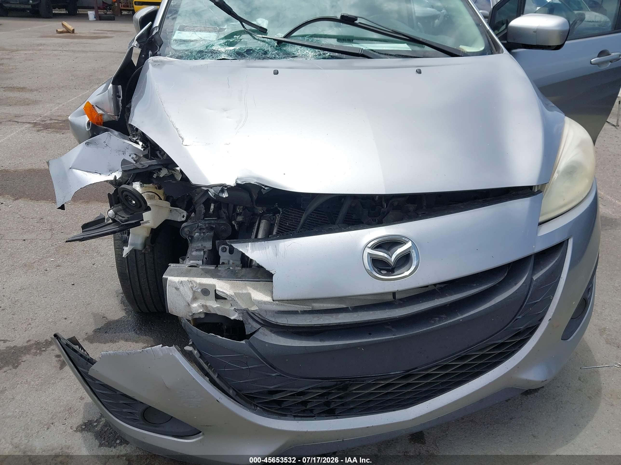 2012 Mazda Mazda5 Sport Серебряный vin: JM1CW2BL4C0125568