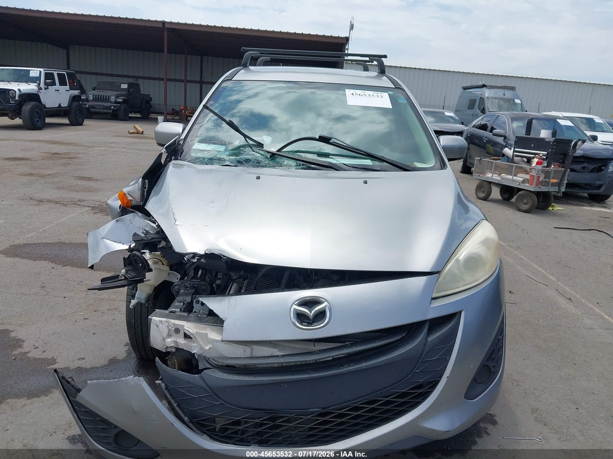 2012 Mazda Mazda5 Sport Серебряный vin: JM1CW2BL4C0125568