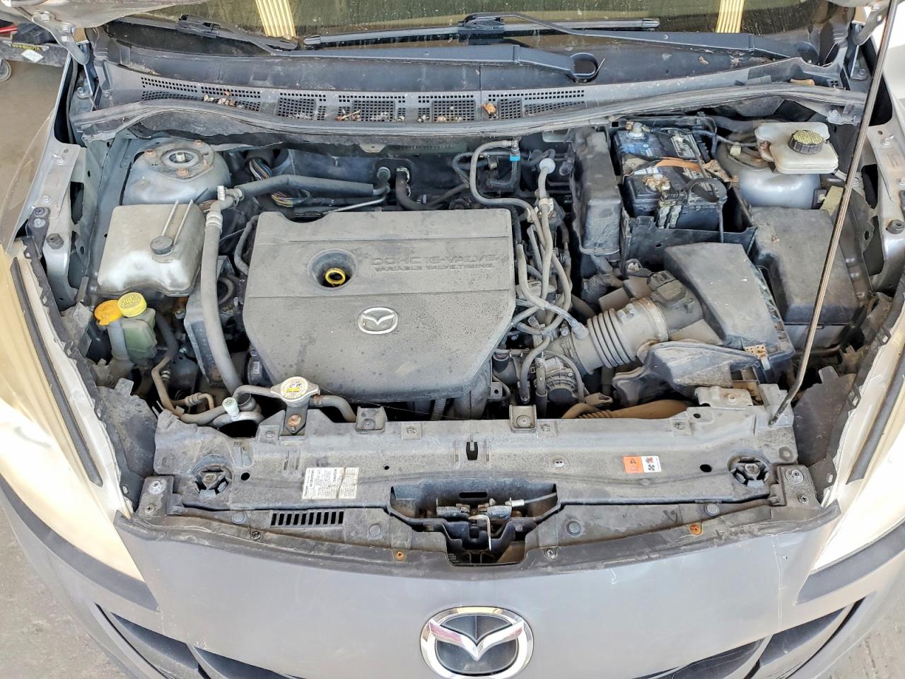 2012 Mazda 5 Серебряный vin: JM1CW2BL6C0112885