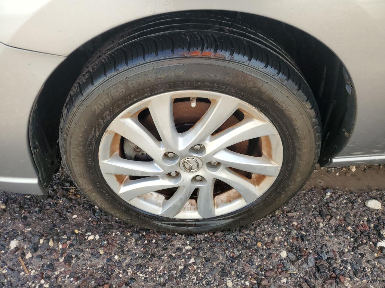2012 Mazda 5 Silver vin: JM1CW2BL9C0115537 Damage: Left Front Wheel, Curb Rash, 1 To 2 Inches