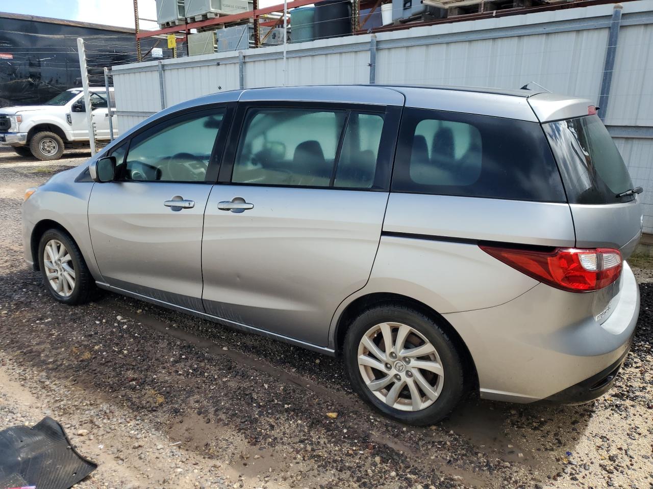 2012 Mazda 5 Silver vin: JM1CW2BL9C0115537 Damage: Left Rear Door, Dent(S) W/No Paint Dmg, Pdr-1 Dent