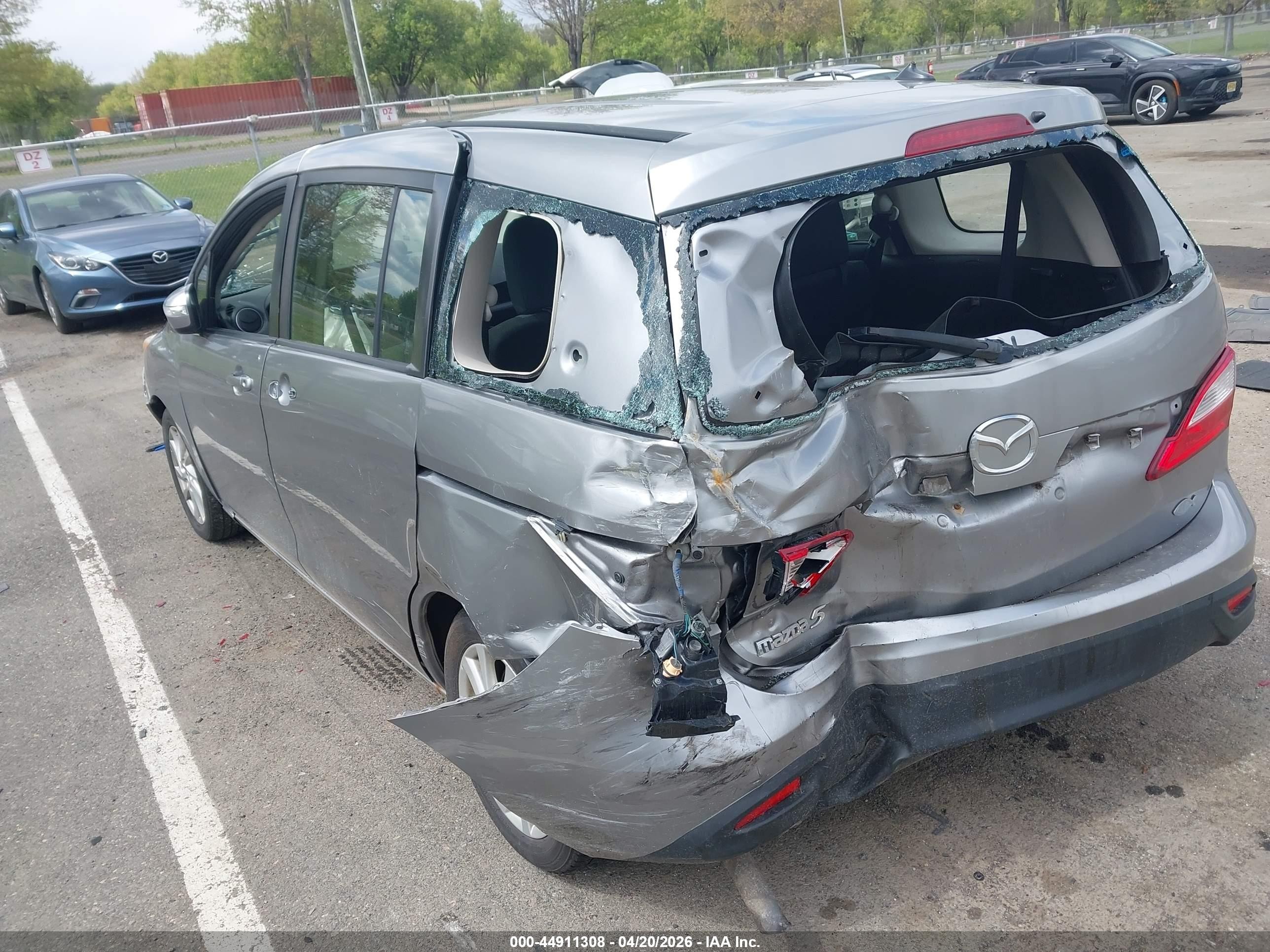 2015 Mazda Mazda5 Sport Silver vin: JM1CW2BL9F0184359