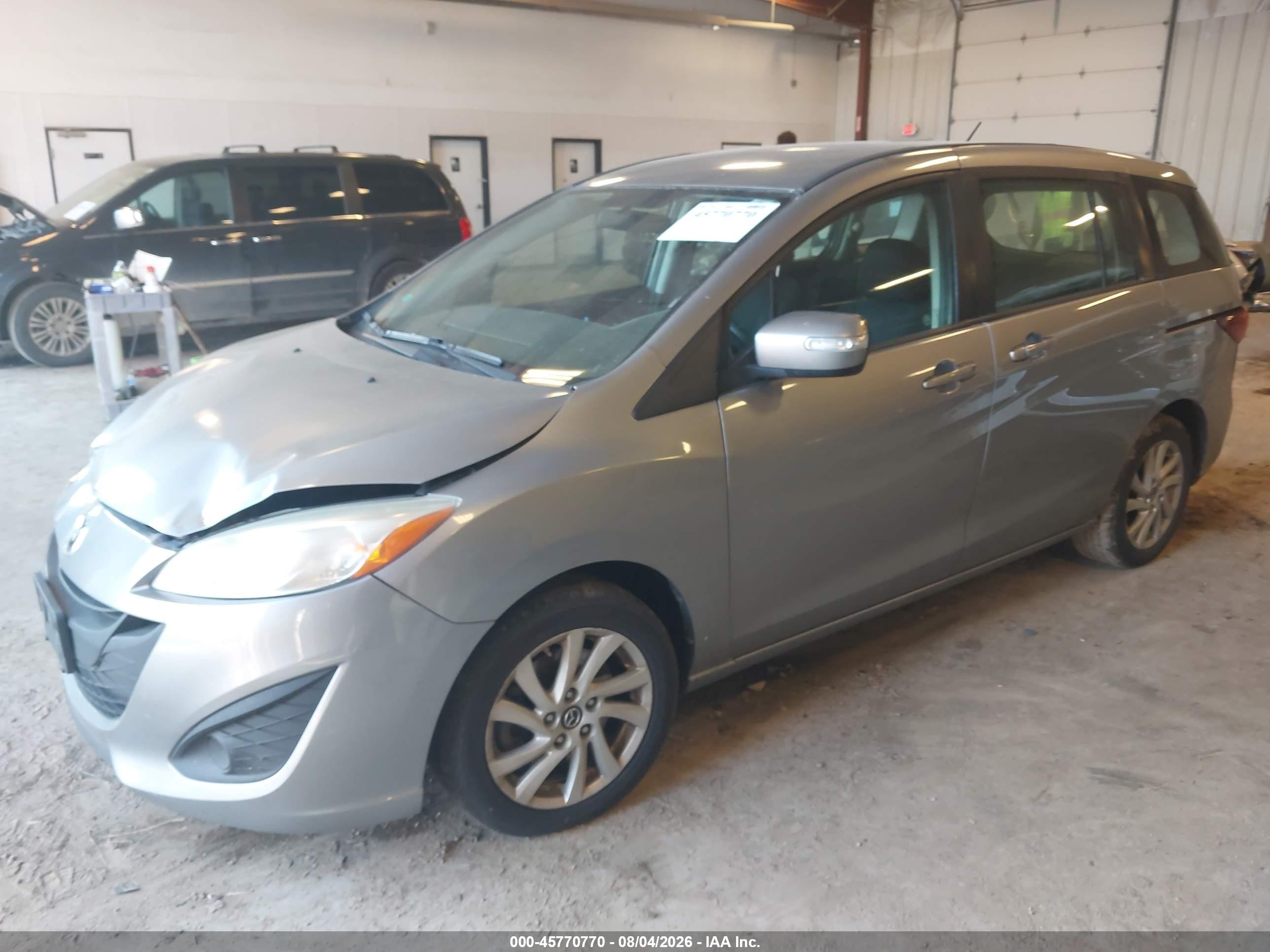 2014 Mazda Mazda5 Sport Silver vin: JM1CW2BLXE0171120