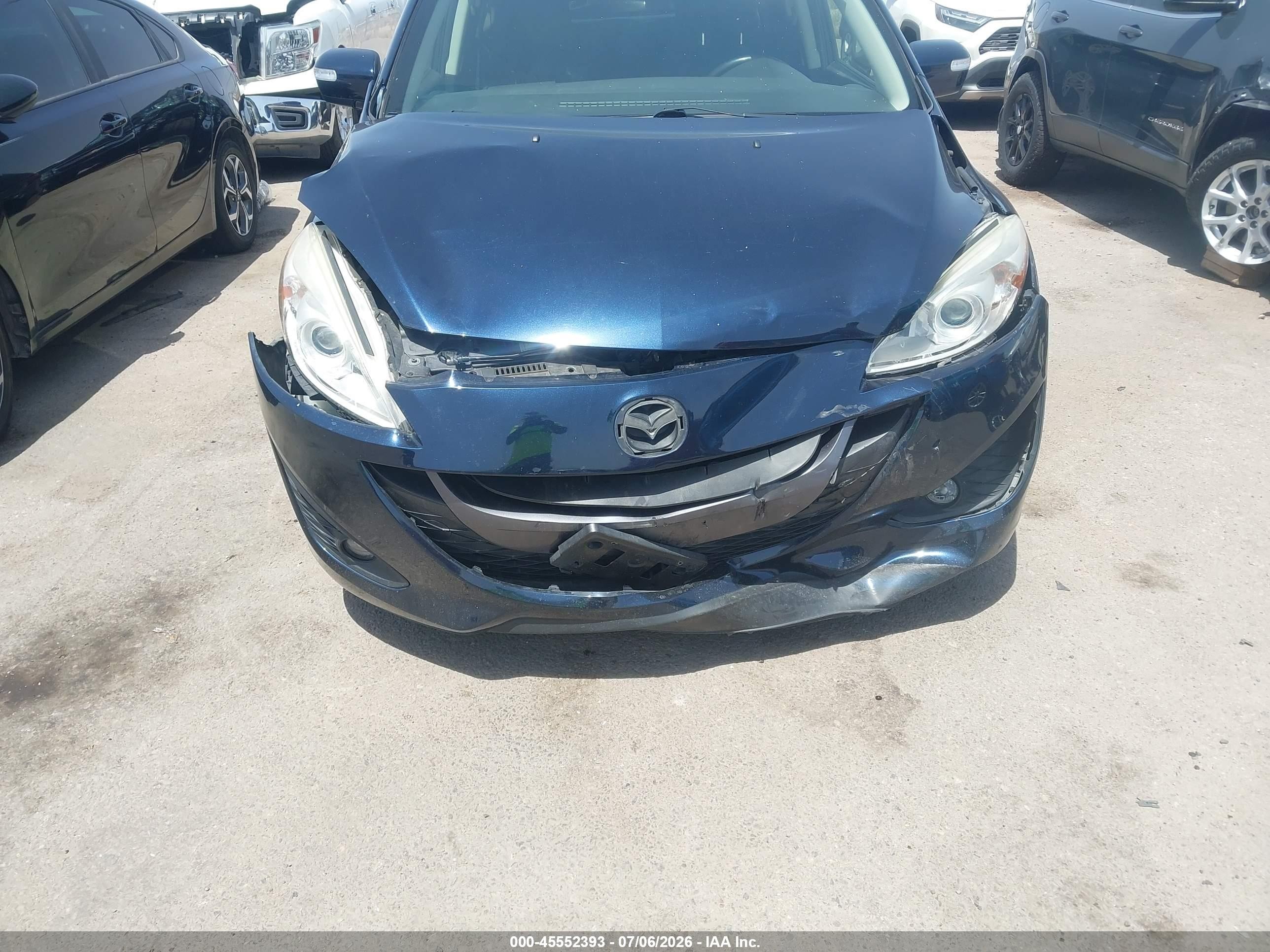 2015 Mazda Mazda5 Touring Dark Blue vin: JM1CW2CL6F0180557