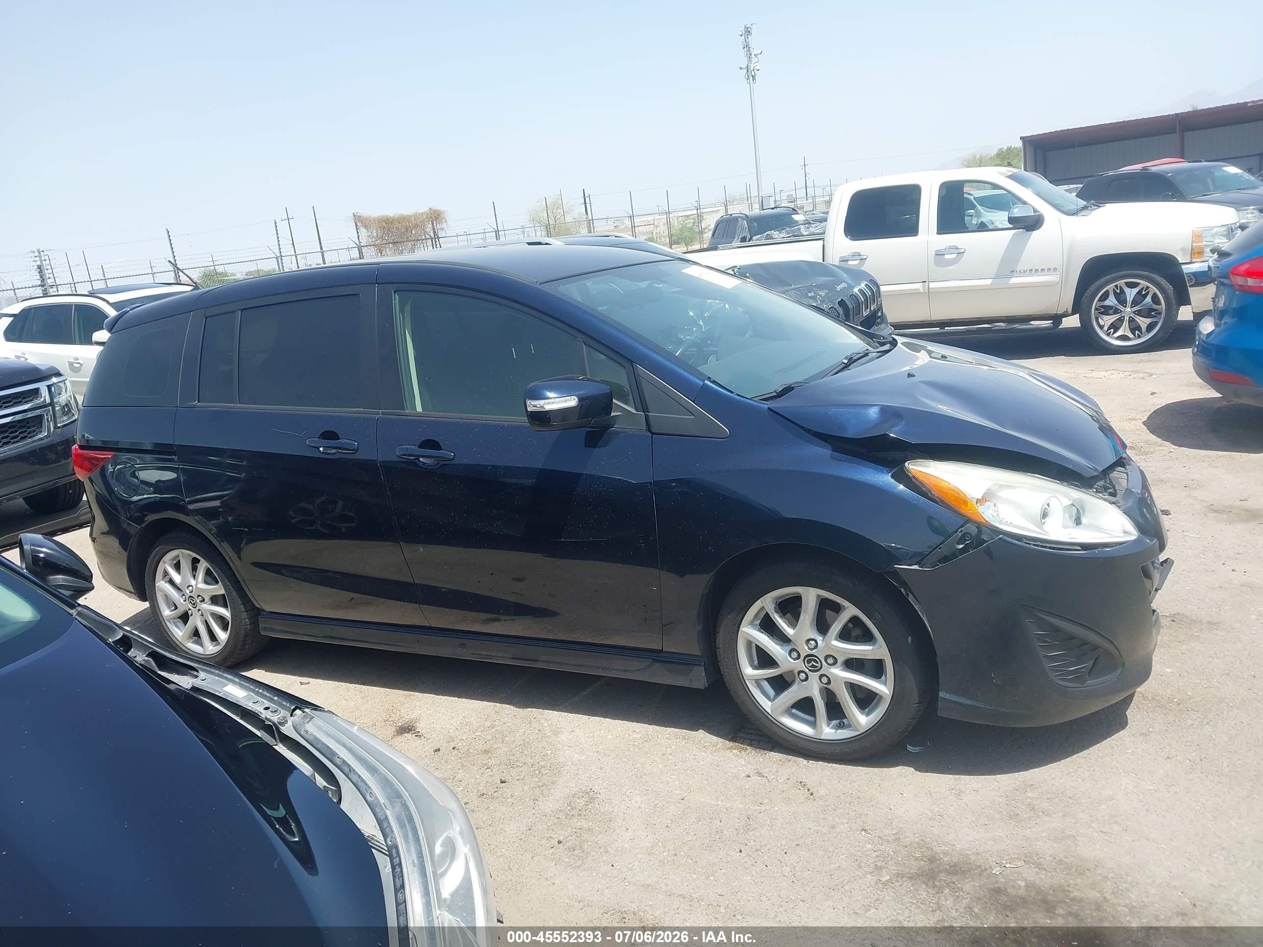 2015 Mazda Mazda5 Touring Dark Blue vin: JM1CW2CL6F0180557