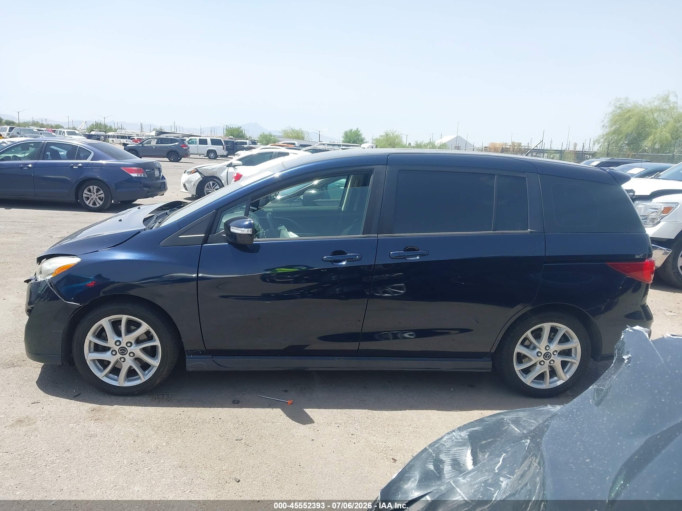 2015 Mazda Mazda5 Touring Dark Blue vin: JM1CW2CL6F0180557