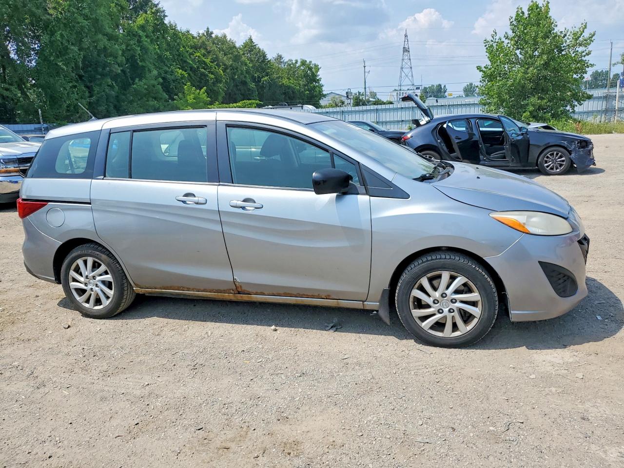 2012 Mazda 5 Silver vin: JM1CW2CL9C0131235