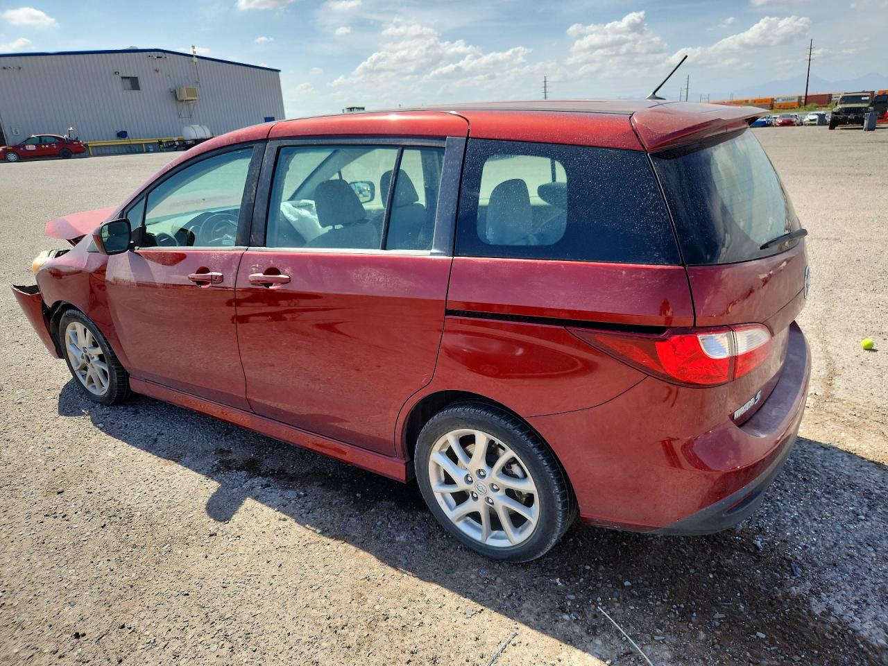 2012 Mazda 5 Темно-бордовый vin: JM1CW2CLXC0107624