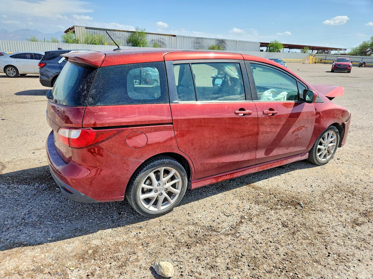 2012 Mazda 5 Темно-бордовый vin: JM1CW2CLXC0107624
