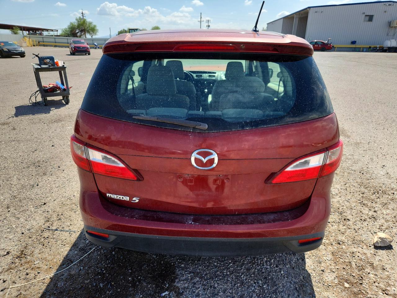 2012 Mazda 5 Темно-бордовый vin: JM1CW2CLXC0107624