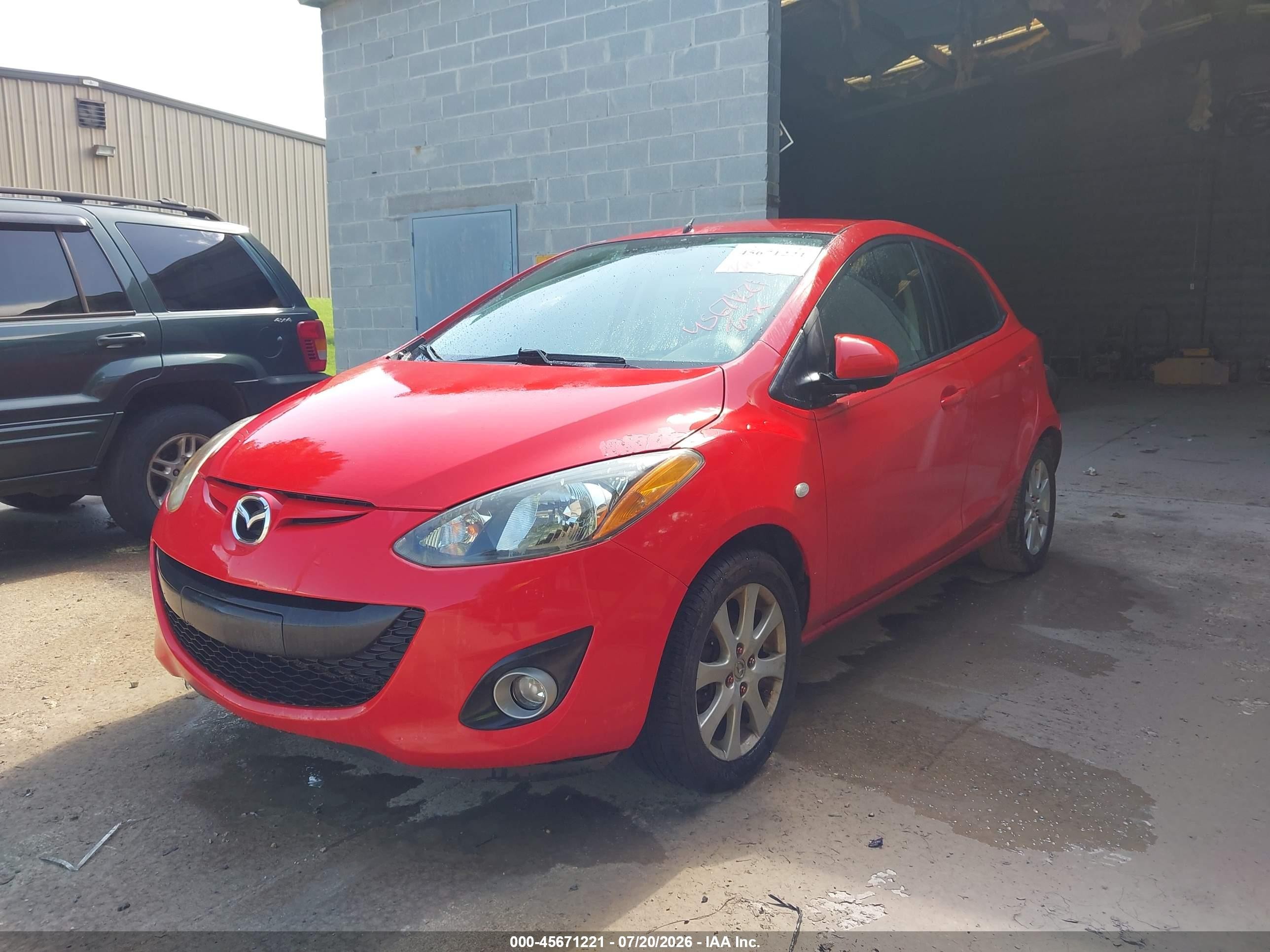 2011 Mazda Mazda2 Touring Red vin: JM1DE1HY0B0114036