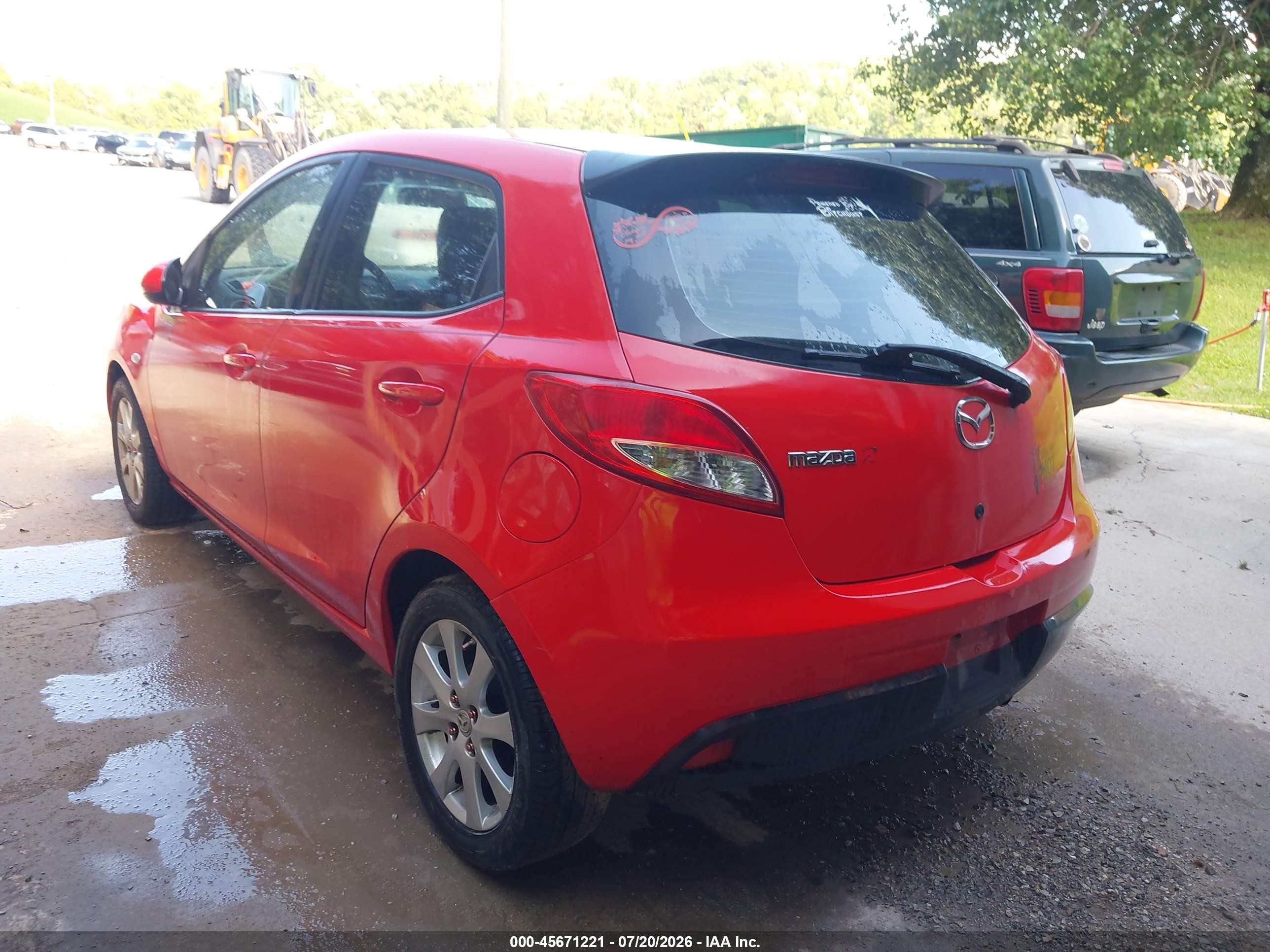 2011 Mazda Mazda2 Touring Red vin: JM1DE1HY0B0114036