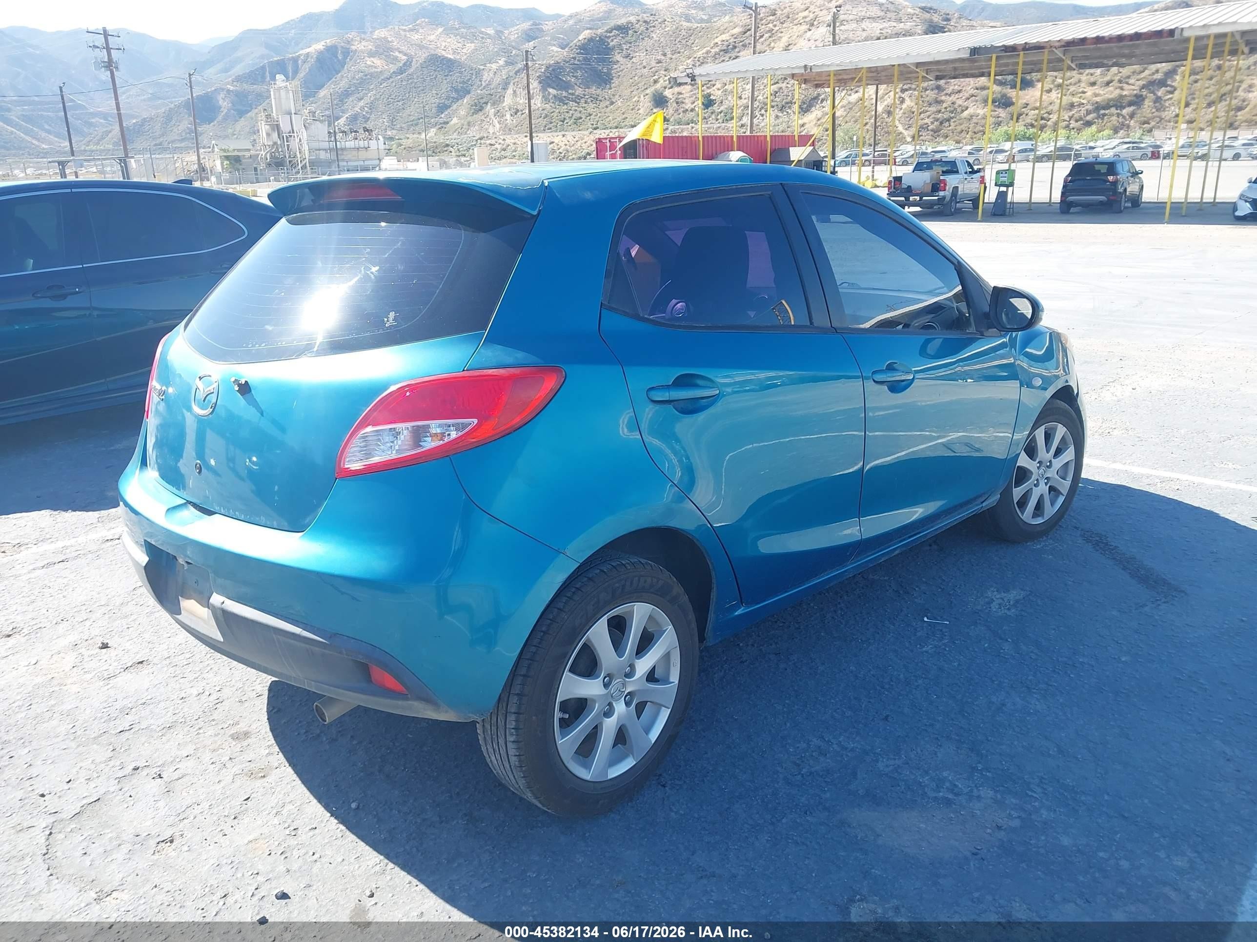 2011 Mazda Mazda2 Touring Blue vin: JM1DE1HY0B0131239