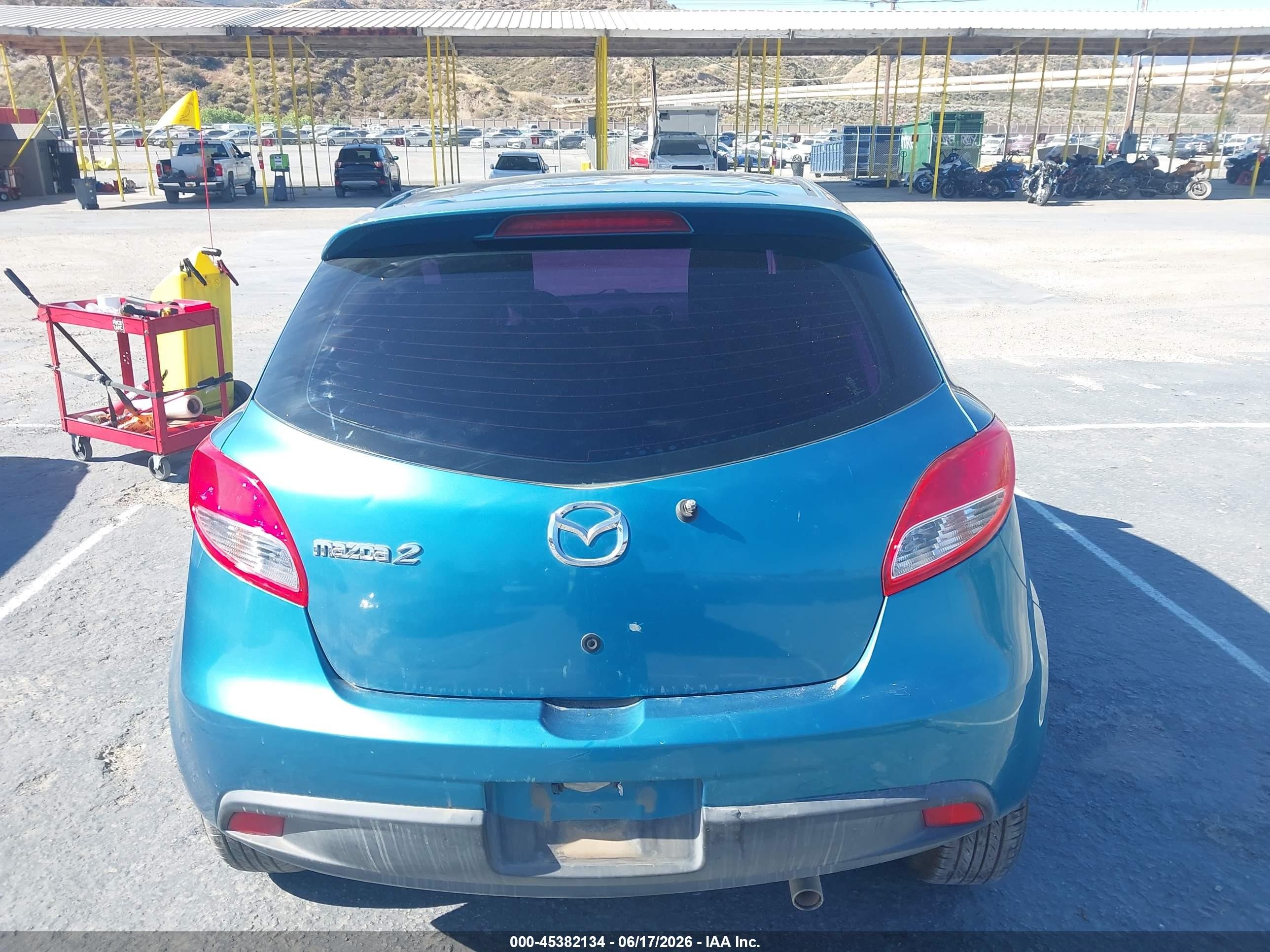2011 Mazda Mazda2 Touring Blue vin: JM1DE1HY0B0131239