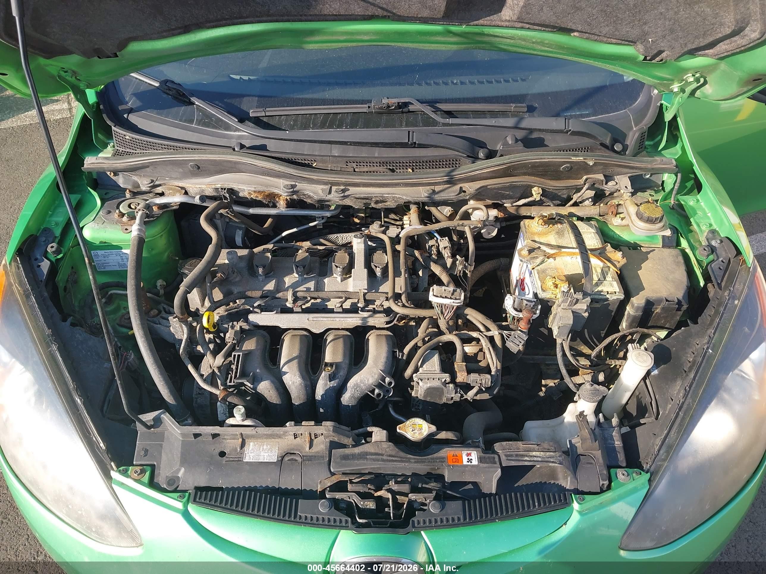 2011 Mazda Mazda2 Touring Green vin: JM1DE1HY1B0115325